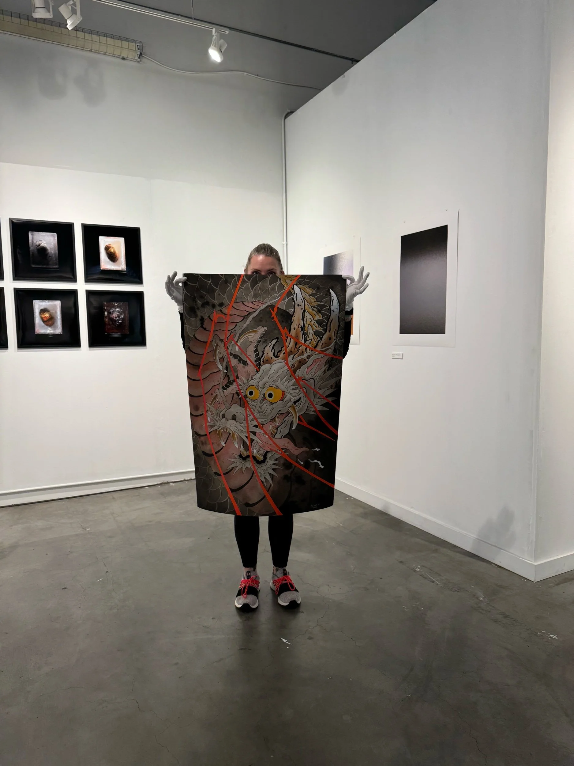 Size comparison photo, giclee prints for the Year of the Dragon painting submission for the Year of the Dragon art show at 111 Minna, in San Francisco, by Bay Area tattoo artist, Cindy Maxwell.