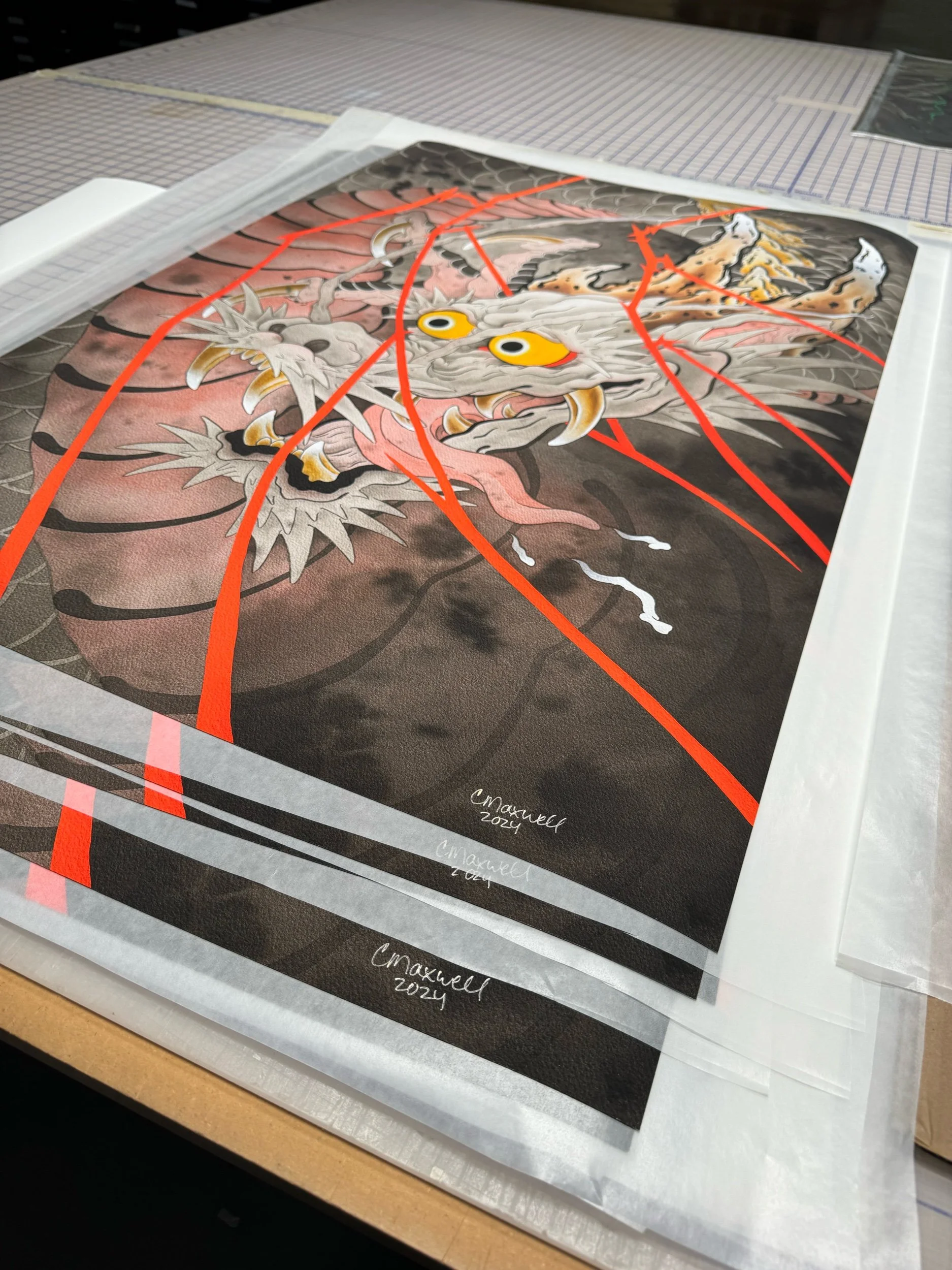 Photo of giclee prints for the Year of the Dragon painting submission for the Year of the Dragon art show at 111 Minna, in San Francisco, by Bay Area tattoo artist, Cindy Maxwell.