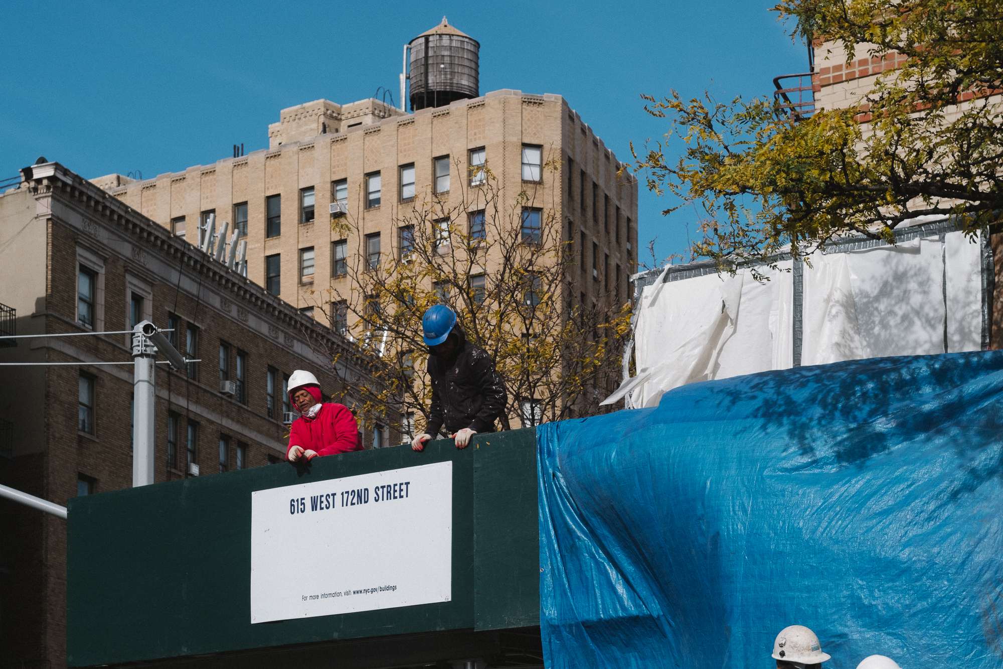 Workers in Washington Heights, Manhattan. Fuji X-Pro 2, Helios 44-4.