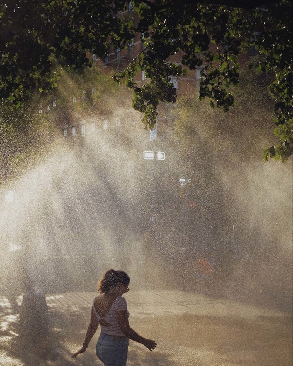 fuji-x100f-photo-walk-summer-nyc-street-shower.jpg