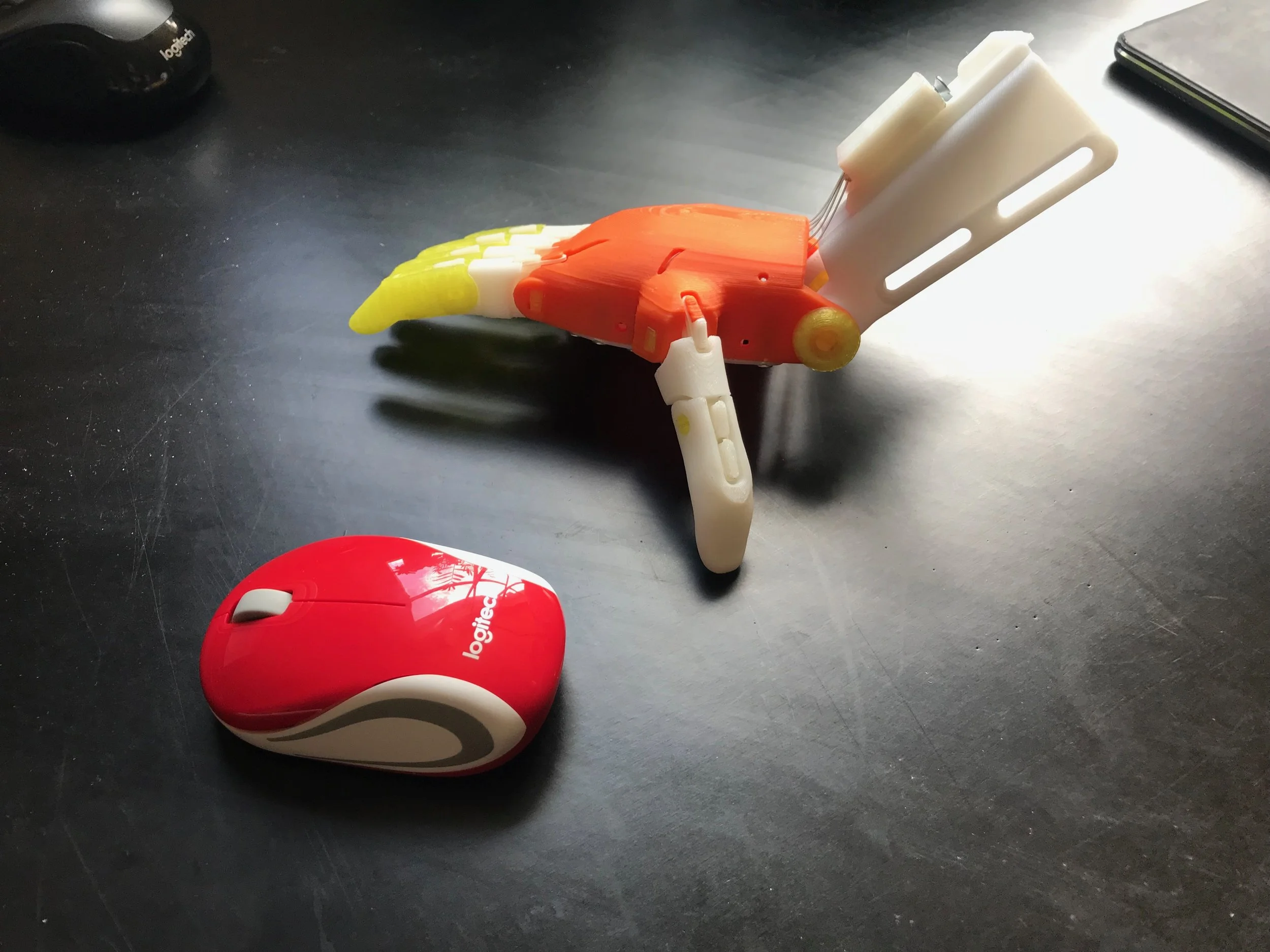 This is a remix of the original e-NABLE Phoenix hand by Jason Bryant with replacement components by John Diamond, Scott Darrow and Andreas Bastian.
