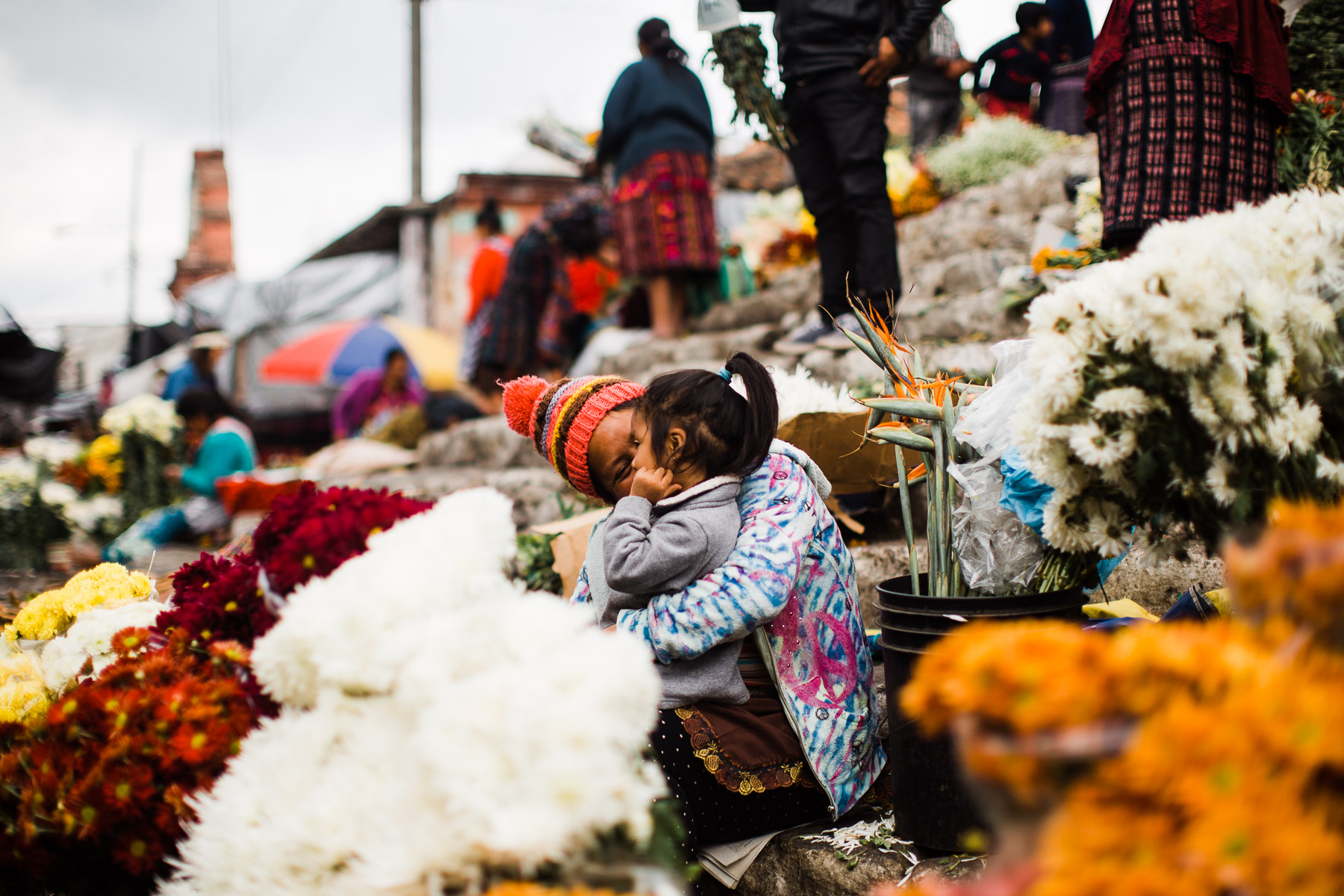 Mother and daughter love Guatemalan flower market