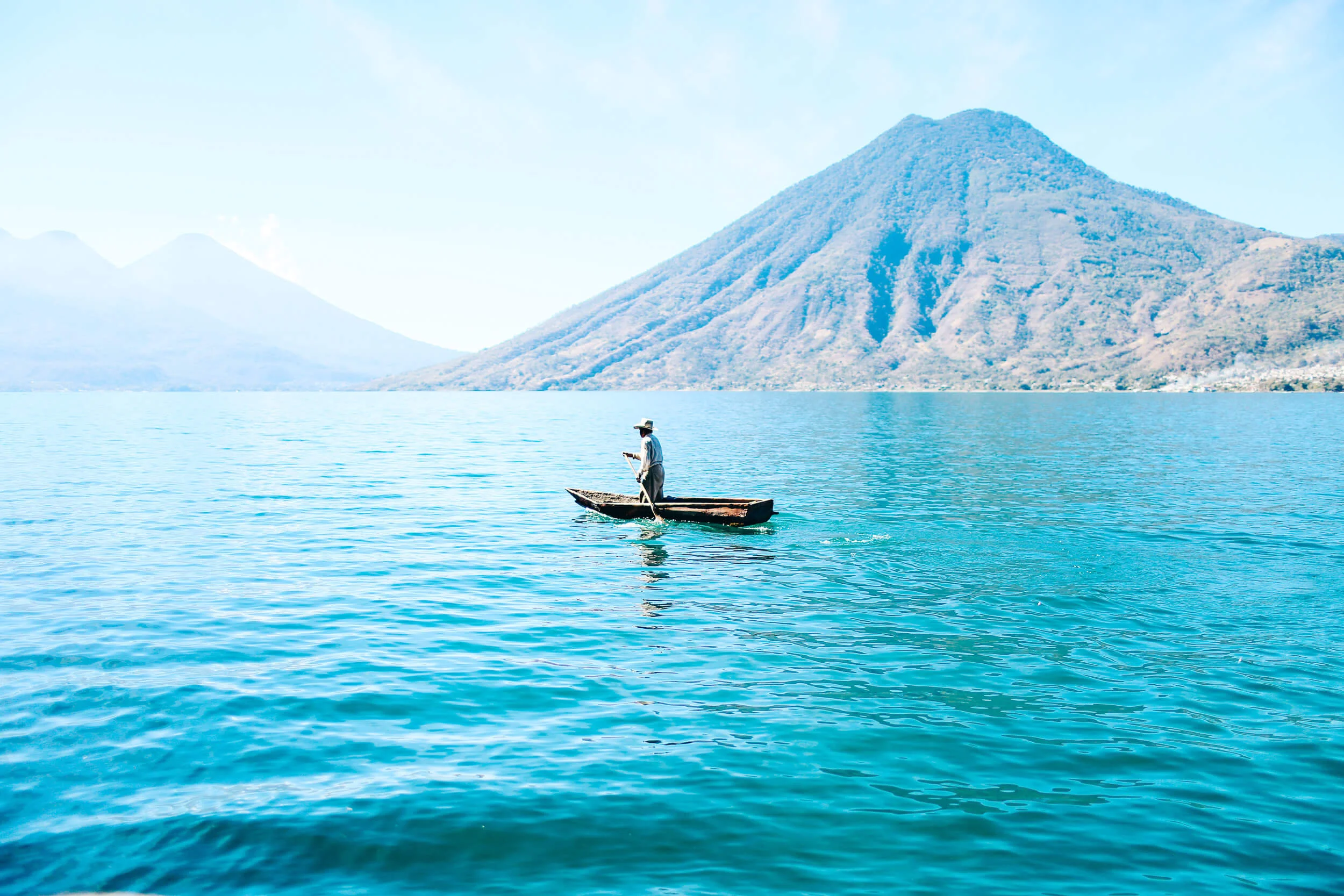 Man canoe Lake Atitlan Guatemala