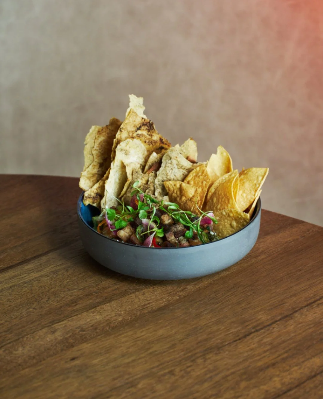 Meet our Pork Belly Guacamole made with crispy pork belly layered with creamy guacamole, bright cotija, and a Fresno chili finish. 🌶️🥑