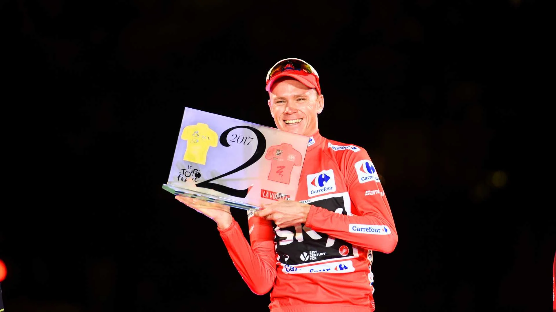 Chris-Froome-Tour-de-France-Vuelta-a-Espana-Grand-Tour-double-red-jersey-Team-Sky-podium-2017-pic-Sirotti.jpg
