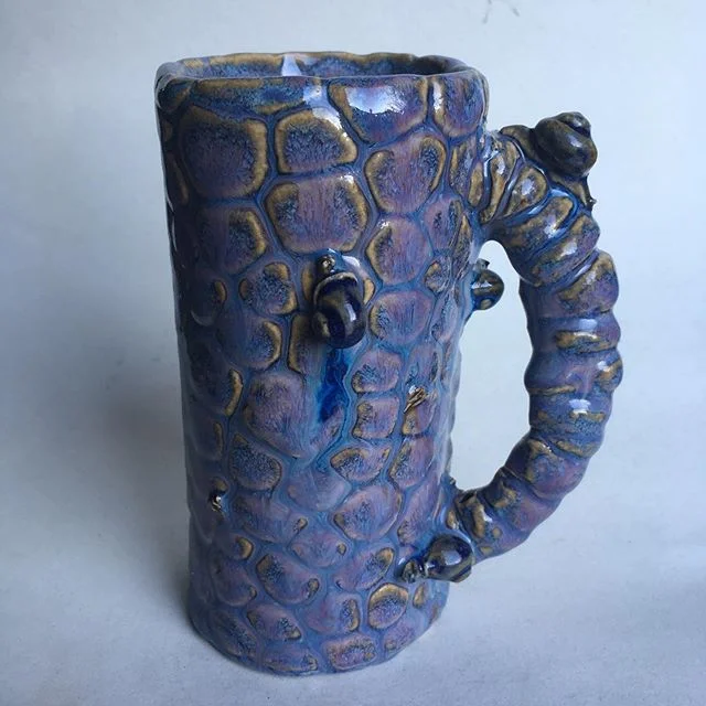 Snail mug! I&rsquo;m right handed, but I made my mugs left-handed (I&rsquo;m an ambidextrous sipper). Incidentally, I learned that most snails are right-spiraled, but all but one of the snails in this mug are left-spiraled, so I guess they&rsquo;re i