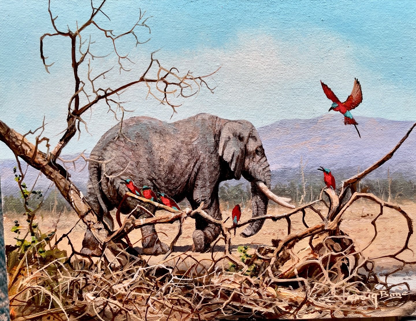Tiny but mighty! ☀️ This miniature oil painting captures the vastness of the African bush, with a parched foreground leading to a distant escarpment reaching for the clear blue sky.  An elephant approaches a watering hole, while playful Carmine Bee-e