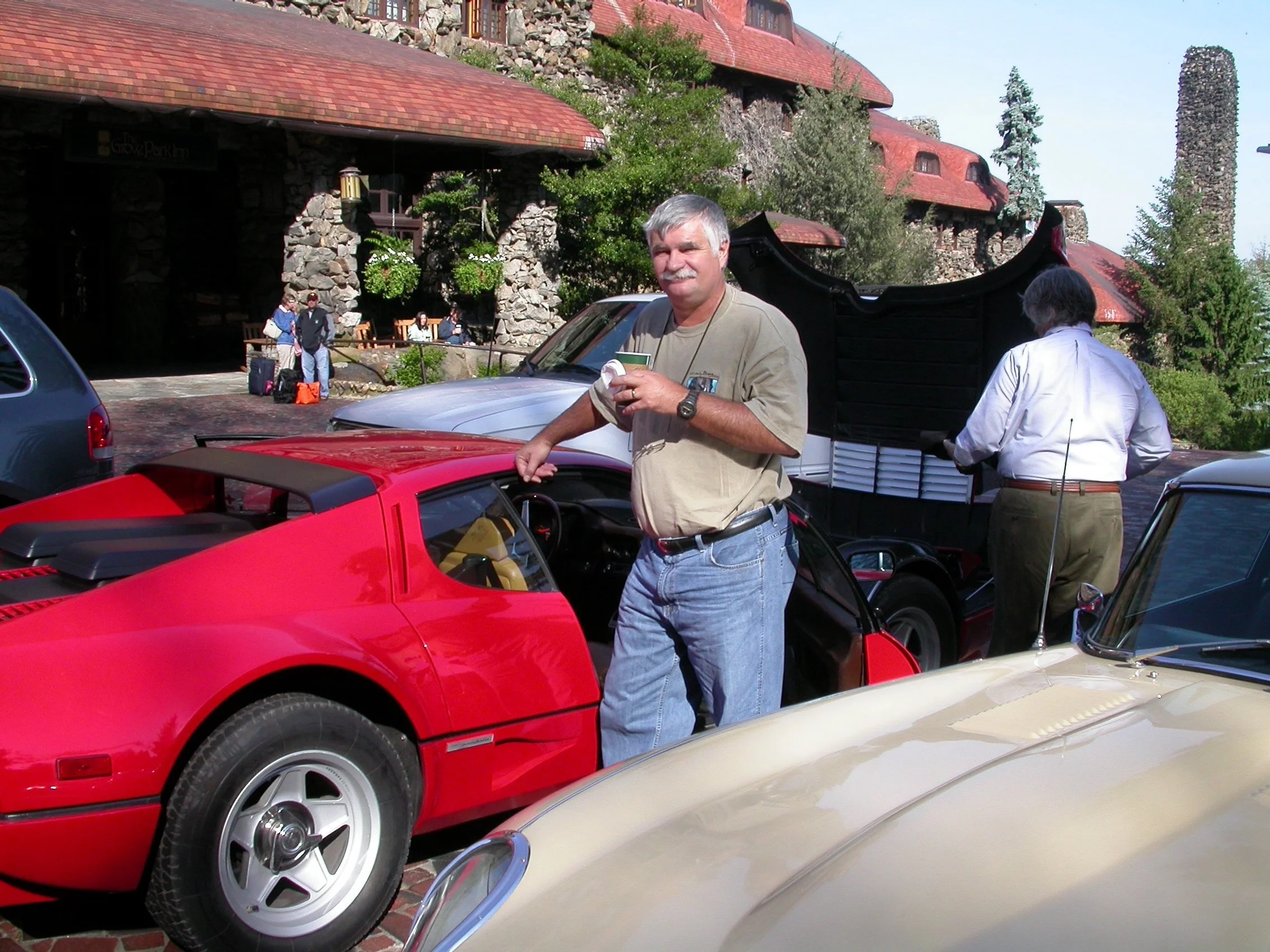 Craig taking part in a vintage car race around the Blue Ridge Mountains. Picture here at the Asheville Omni Grove Park Inn at the start #craigboneartist #ferrari #wildlifeartist
