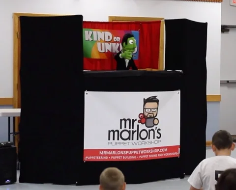Performing a skit on kindness at a local Church.
