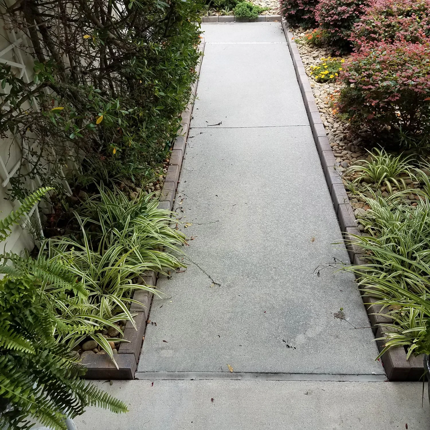 BEFORE: Let us show you how we can integrate walkways, stairs, and other features for a completely new look!