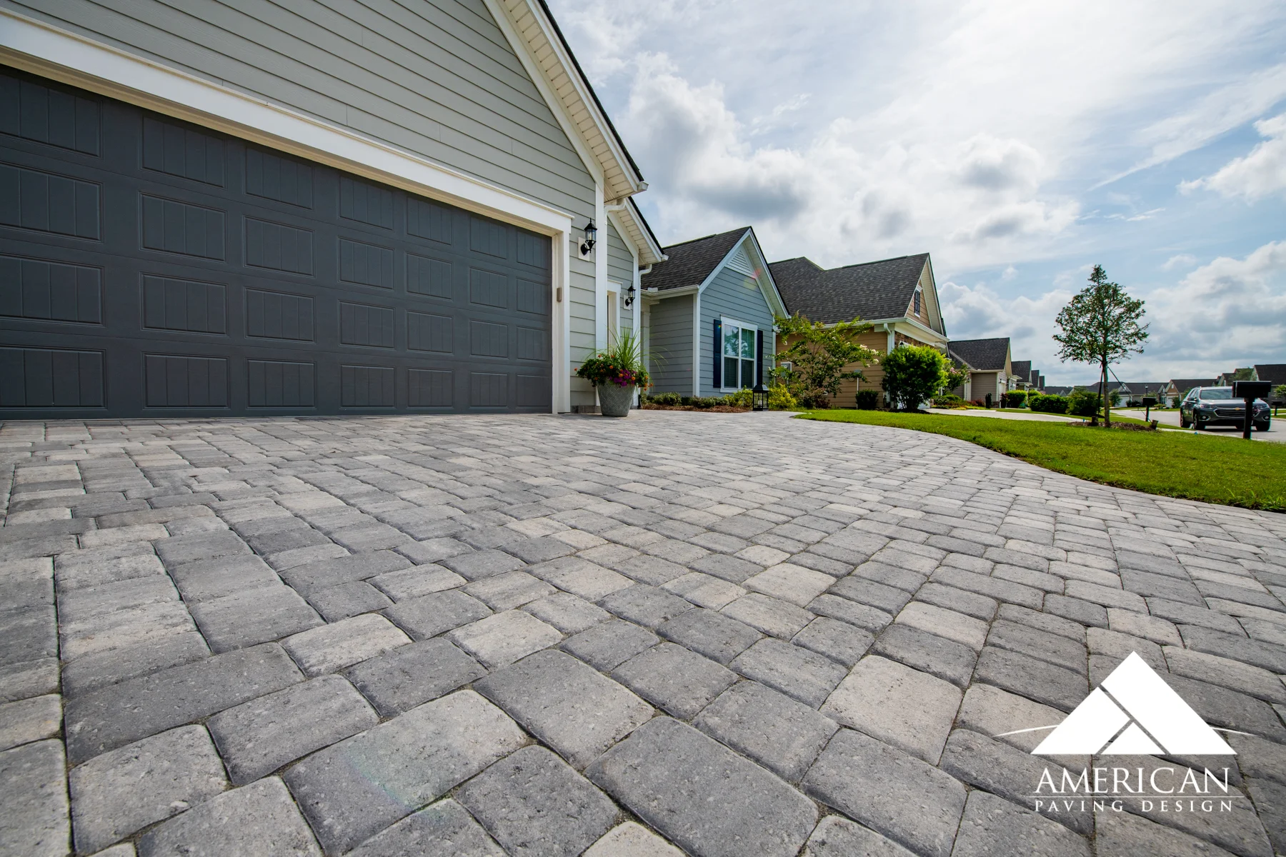 No more tripping hazards! Pavers offer a smooth and durable surface- perfect for your driveway!