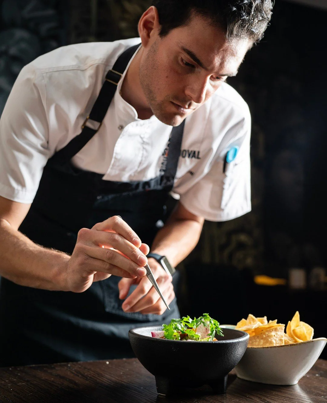 @chefgiancarlosandoval adding the final garnish to our Tuna Guacamole&mdash;a vibrant balance of fresh tuna, avocado, citrus, and spice. Simple ingredients, elevated with care at Maya.
