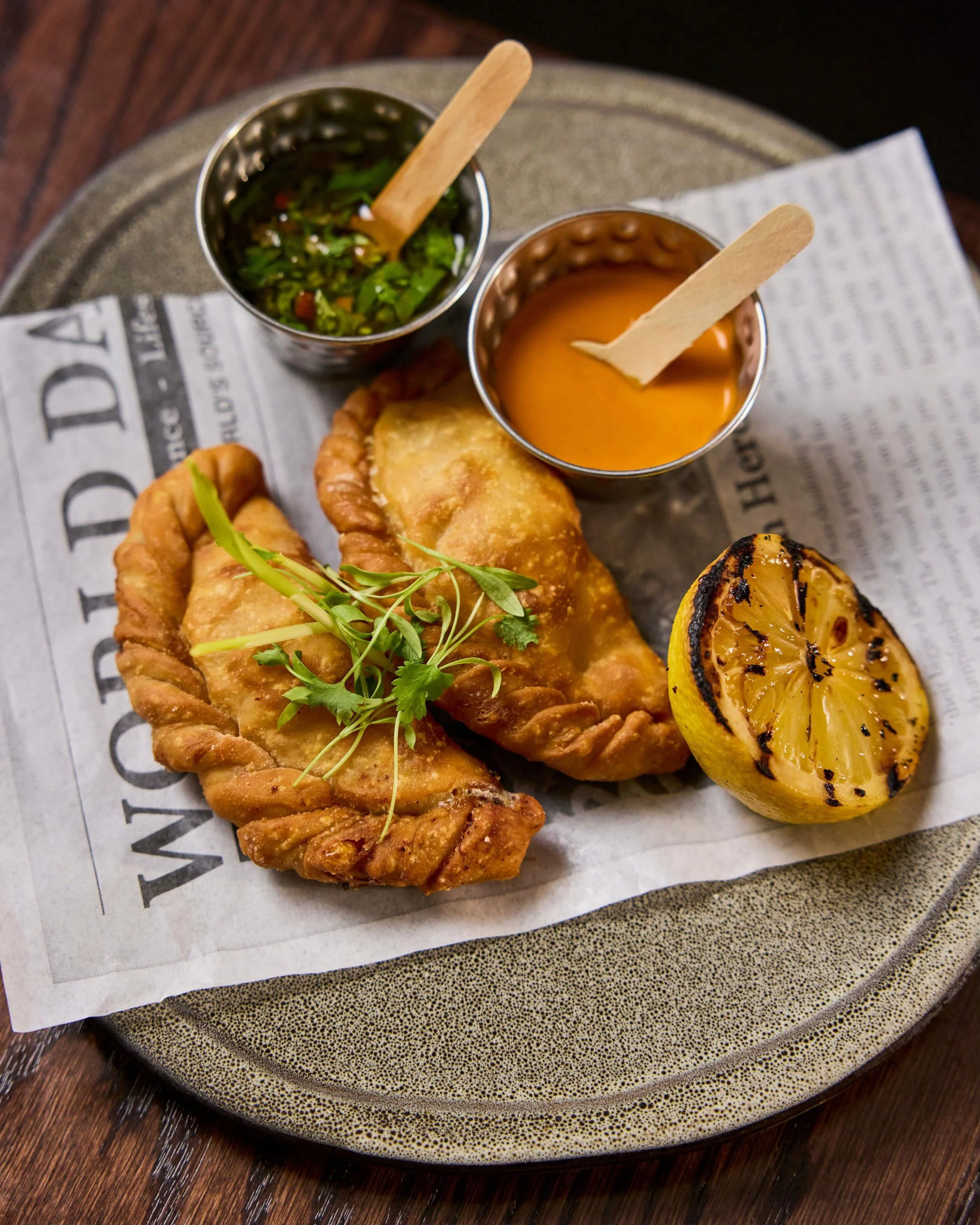 Sweet corn, rich lobster, melted cheese, heat, and herbs all wrapped in one perfect empanada. 🥟