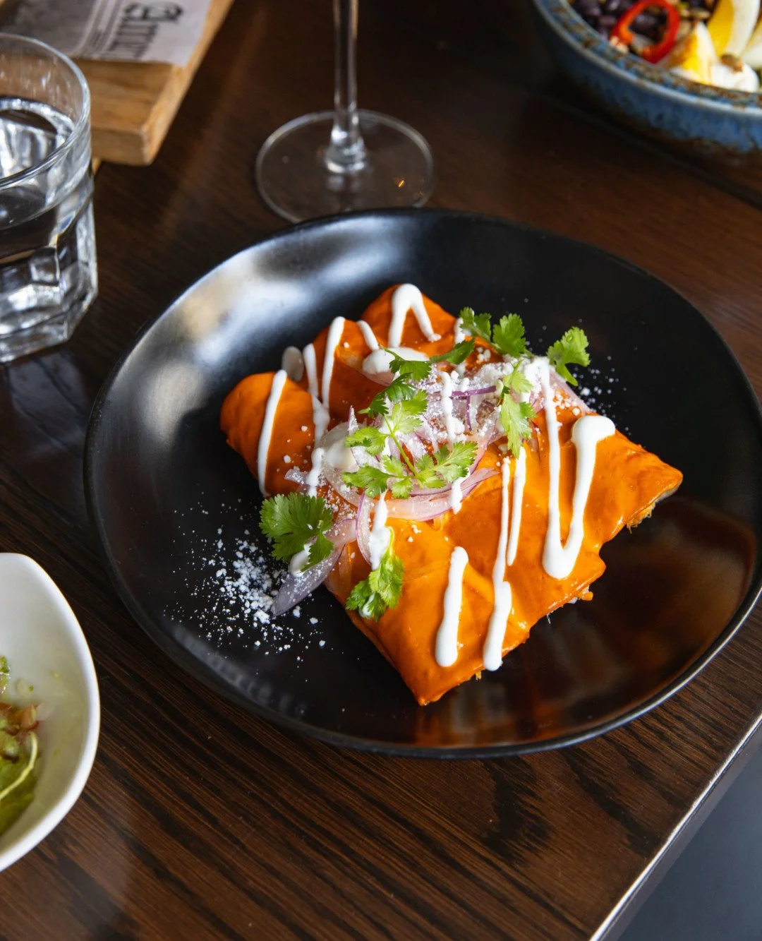 Fresh, creamy, unforgettable chicken enchiladas worth your next visit.
