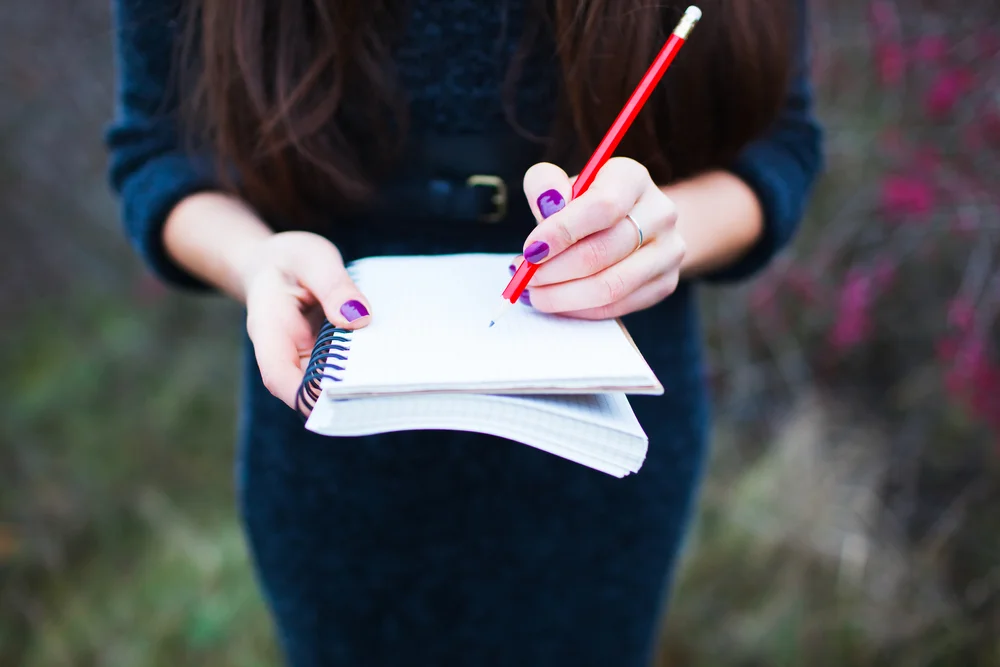 Woman schedules vow writing time.jpg