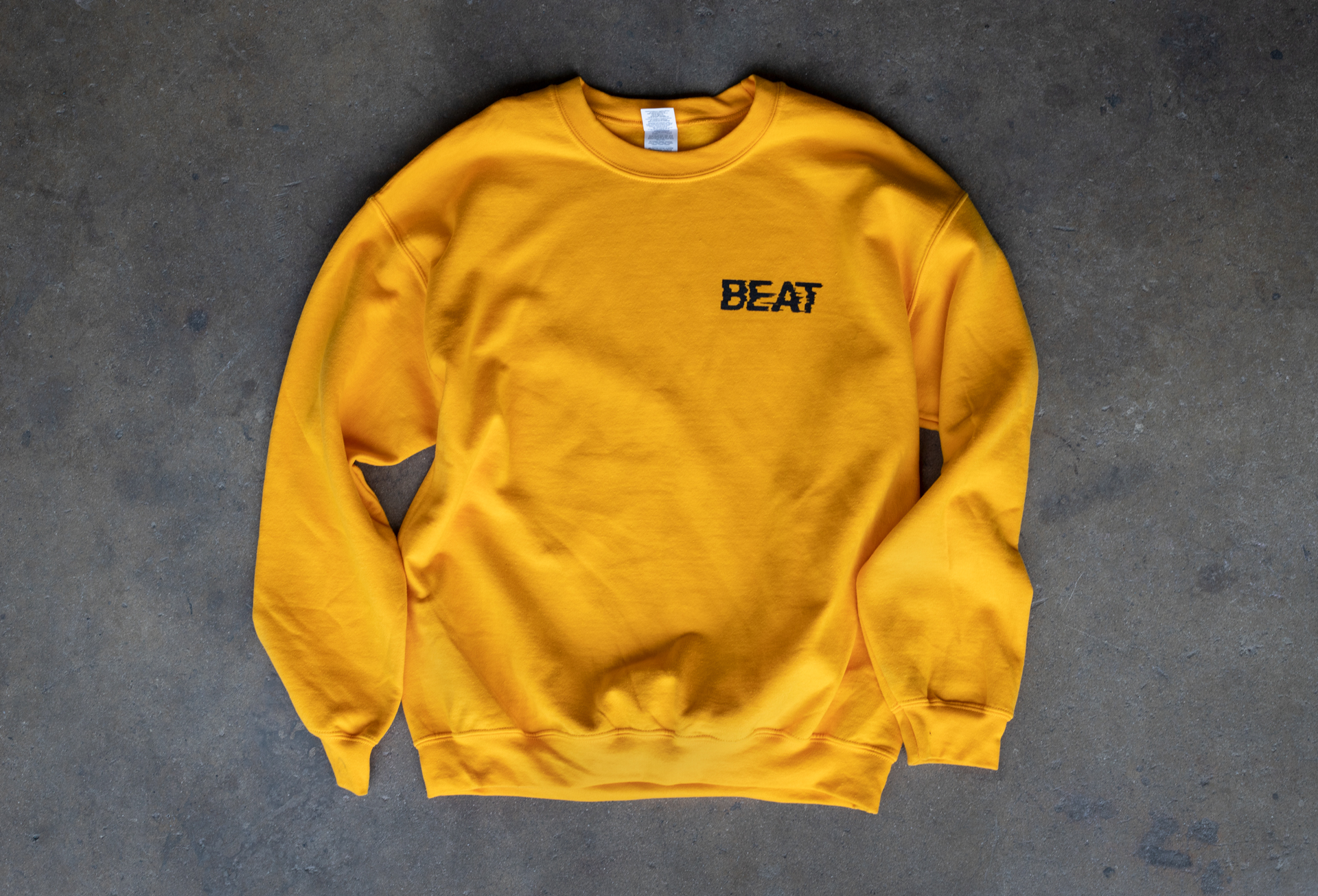 beat-sweater-on-concrete.jpg