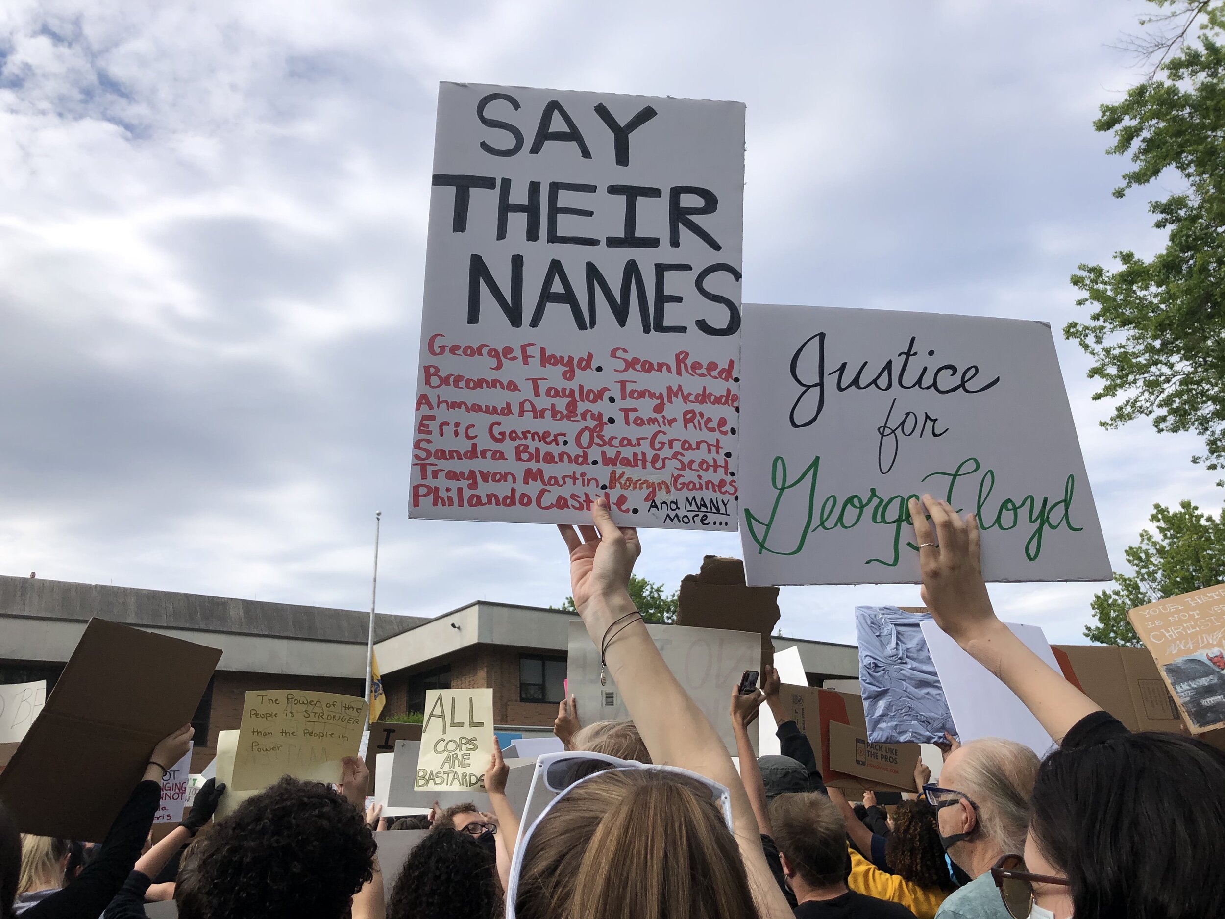  Protestors holding up signs at a rally in Clifton, New Jersey on Tuesday, June 2, 2020.  Photo by: Gab Varano  