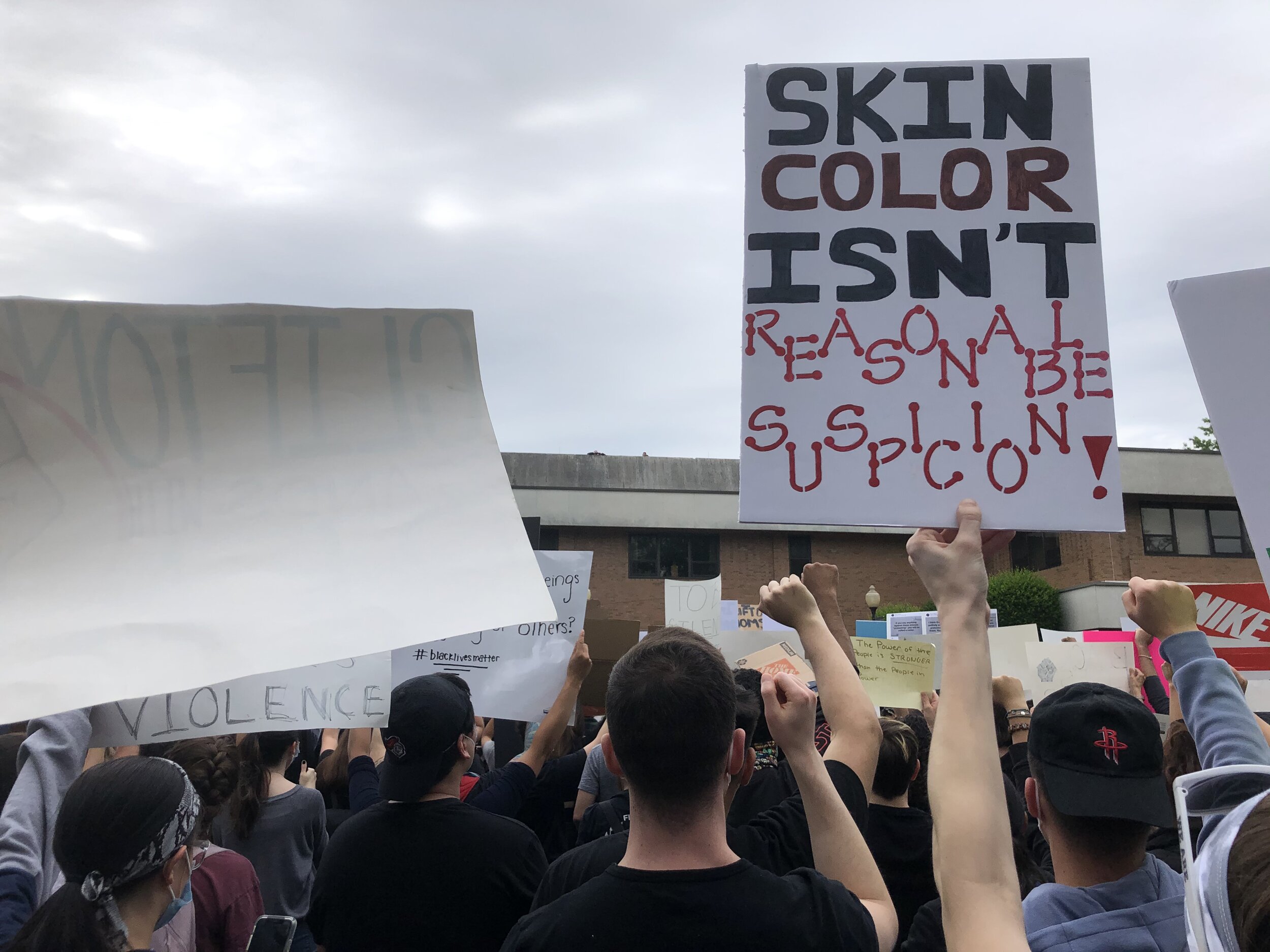  A protestor at a rally in Clifton, NJ on Tuesday, June 2, 2020 held a sign that read, “Skin color isn’t reasonable suspicion.”  Photo by: Gab Varano  