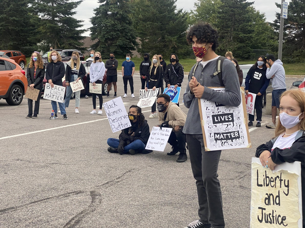  “We wanted everyone here to wear a mask and we have the Justice Frontline Aid marshal here … they have free masks and free hand sanitizer if people don’t have their own,” said Omonigho Egi, the lead organizer of a Black Lives Matter Woodbury protest