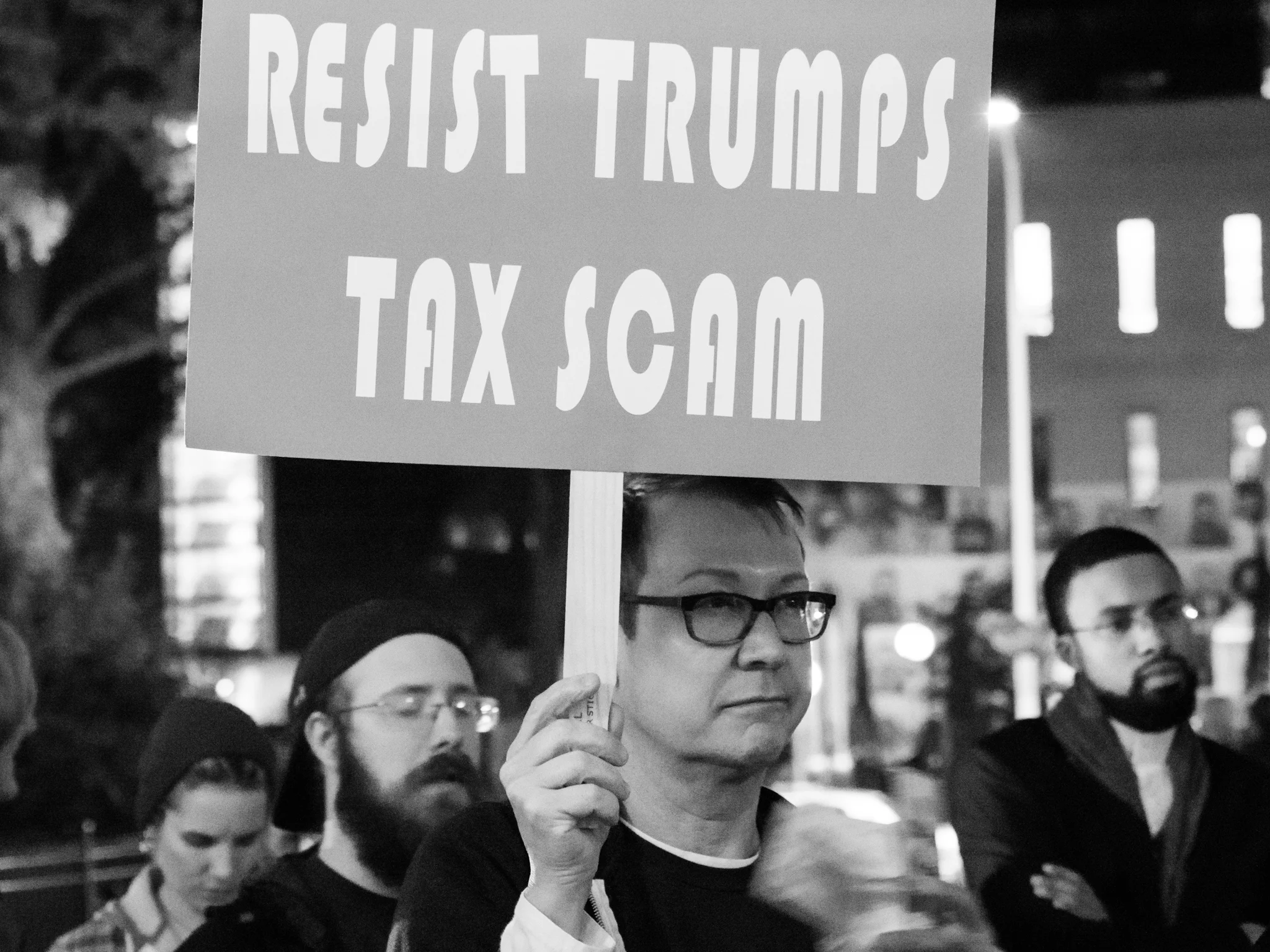 Citizens protest GOP tax bill. Photo courtesy of Wikimedia Commons.