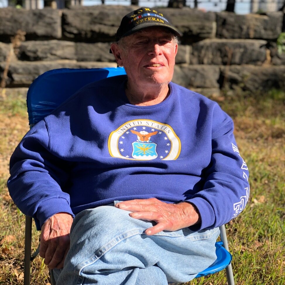  Edward Sliva sits in the lawn of the Independence Park along route of the reservoir.  (Photo Credit: Lysa Vanible)  