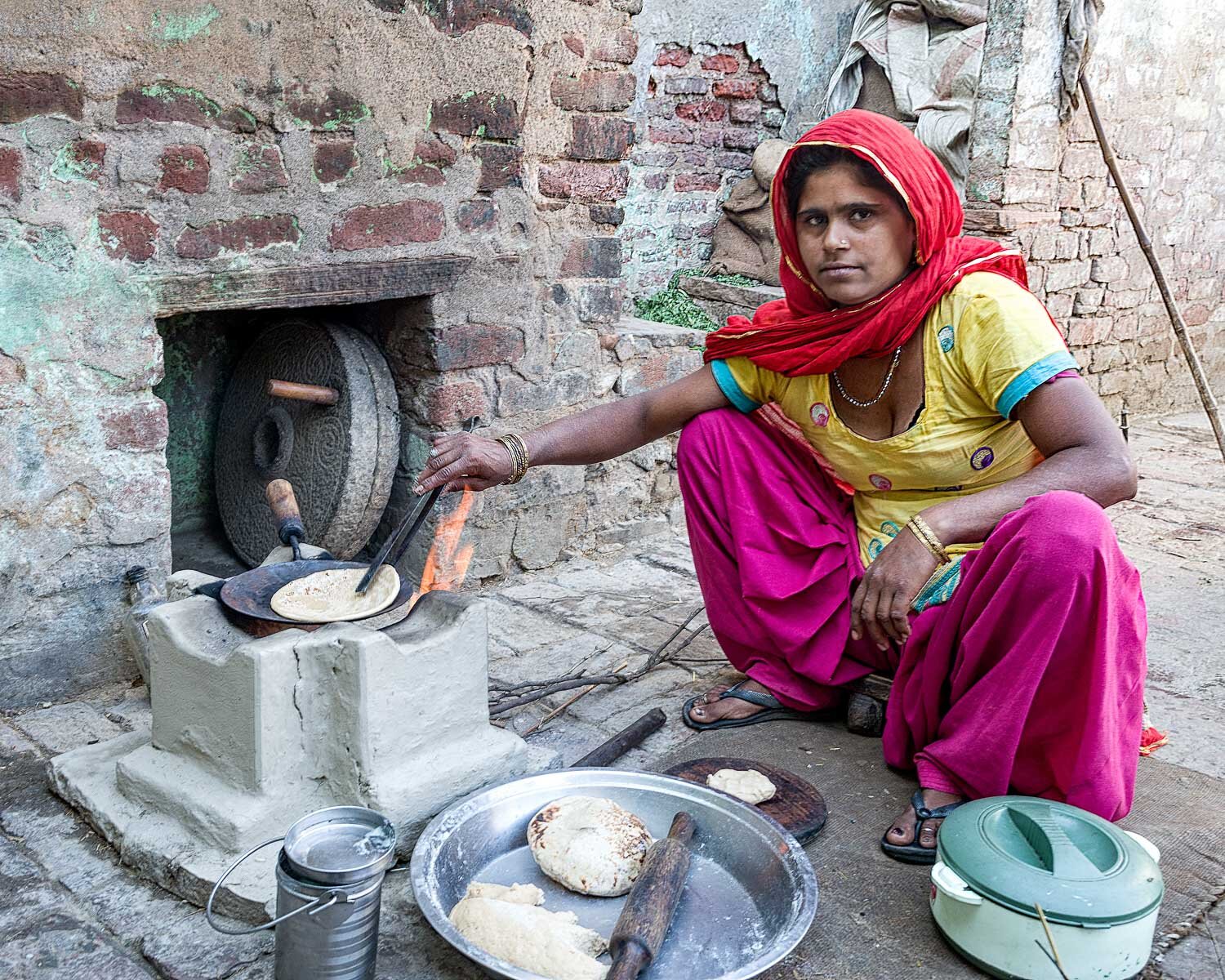 Cooking chapatis, Nandgaon, India
