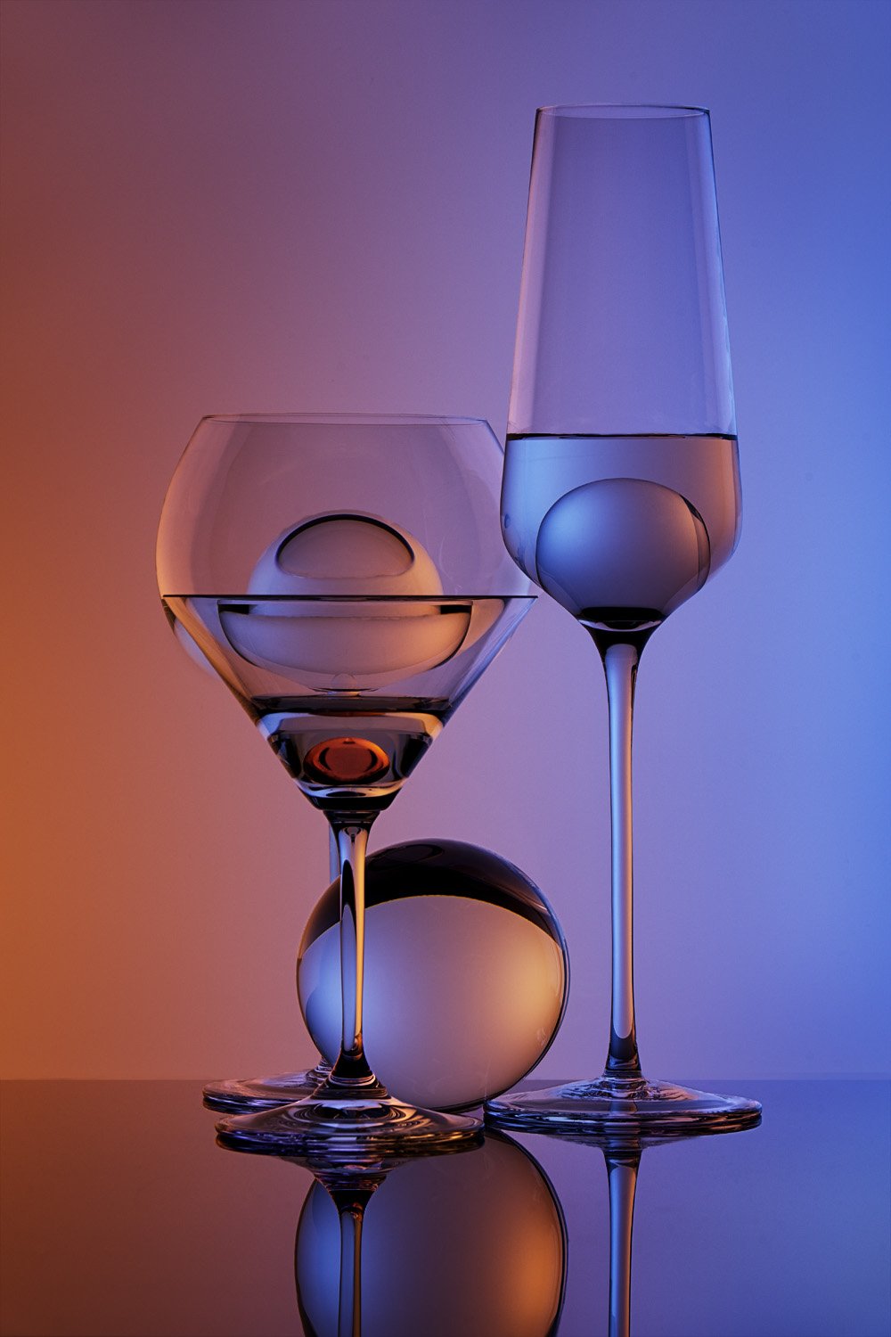 Martini, Balloon Wine and Champagne flute with three balls and a red marble
