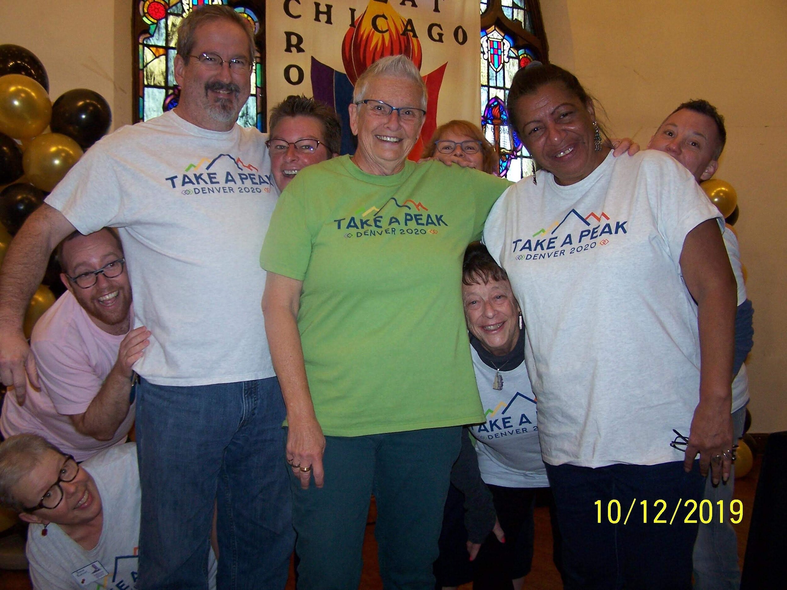   Dayle Hodge, Anne Eubelacker, Sandie Bryant, and a cast of happy Take A Peak, Denver 2020 enthusiasts  