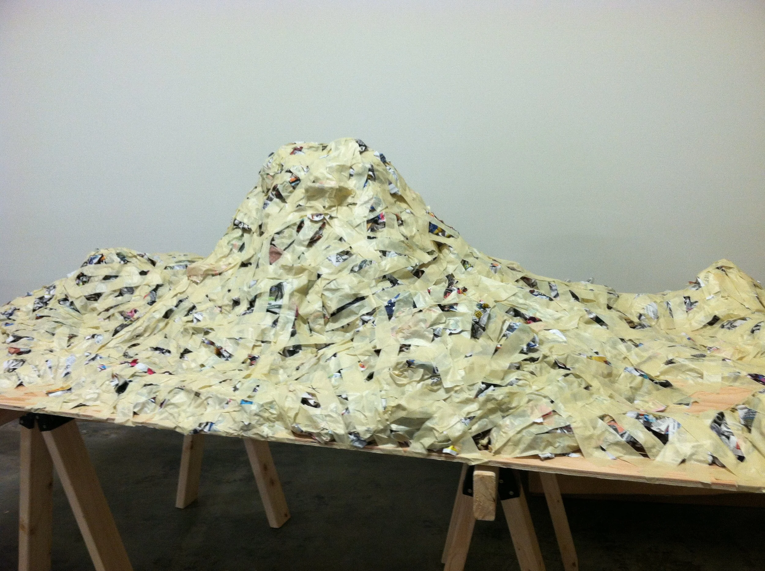 First layer: masking tape and newspaper. 