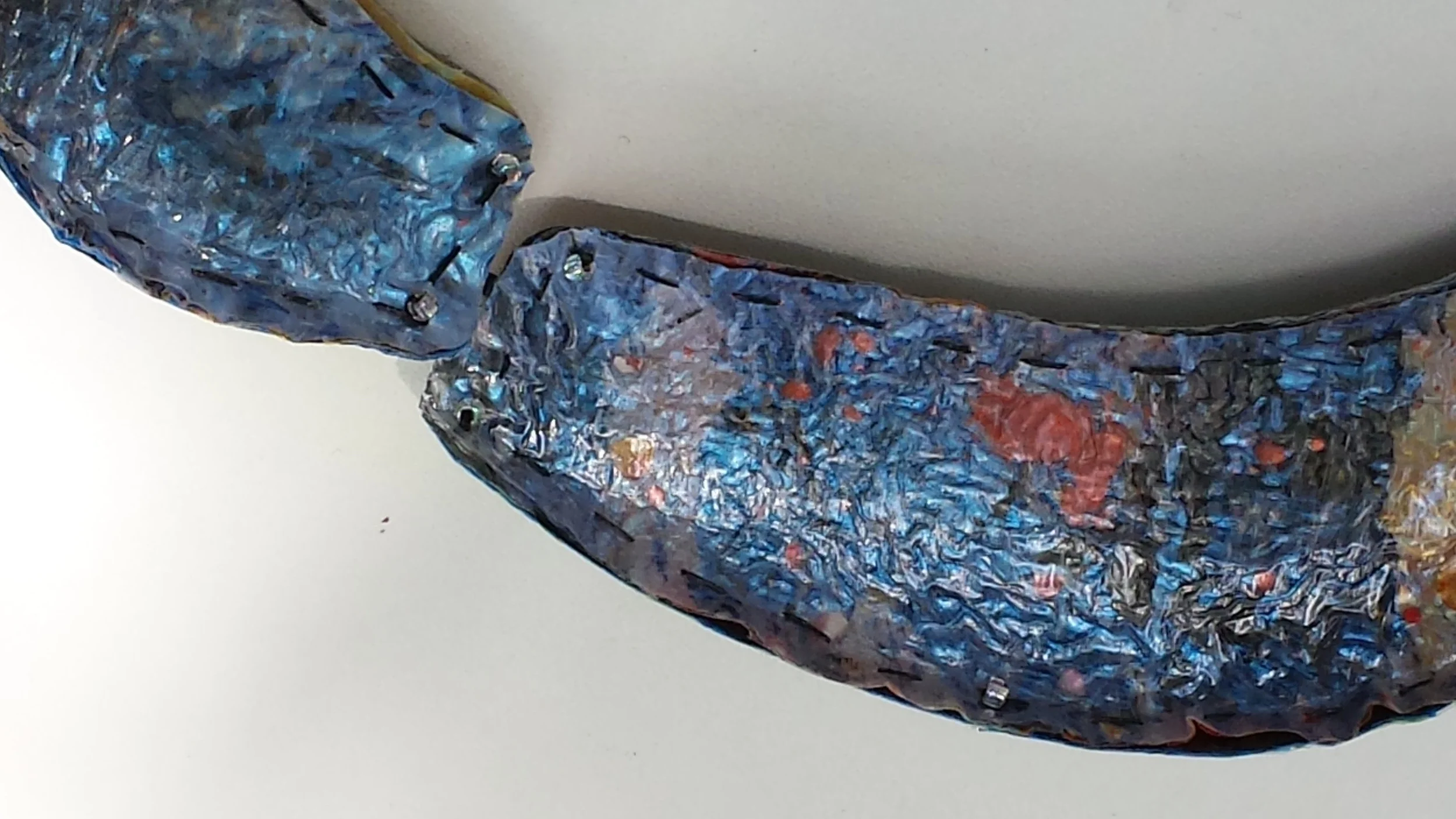 Detail of Reclaimed Necklace (reversible) (2015), painted, fused, and sewn reused plastics, sewn with glass beads, approx 20" long