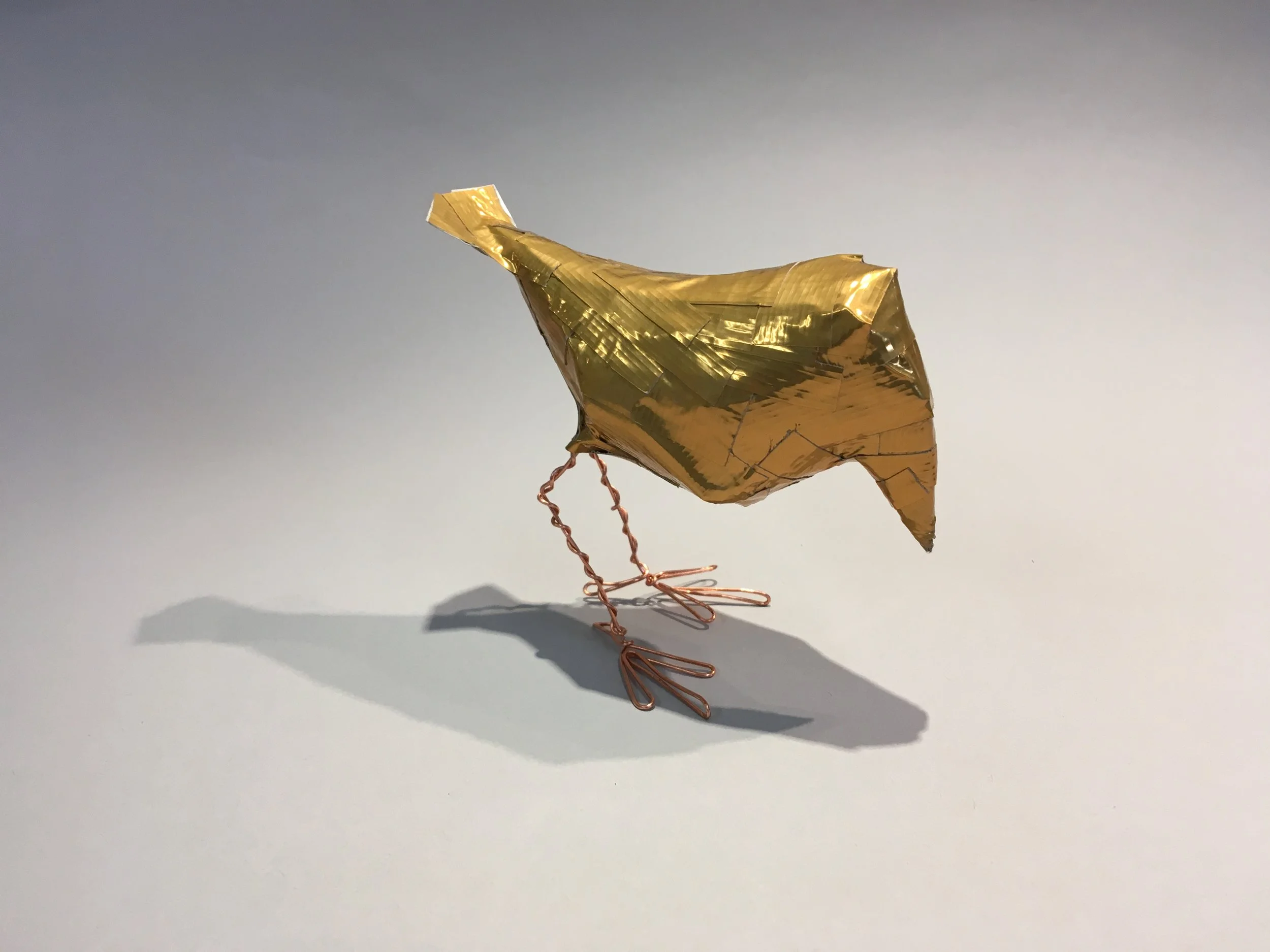 Gold duct tape bird