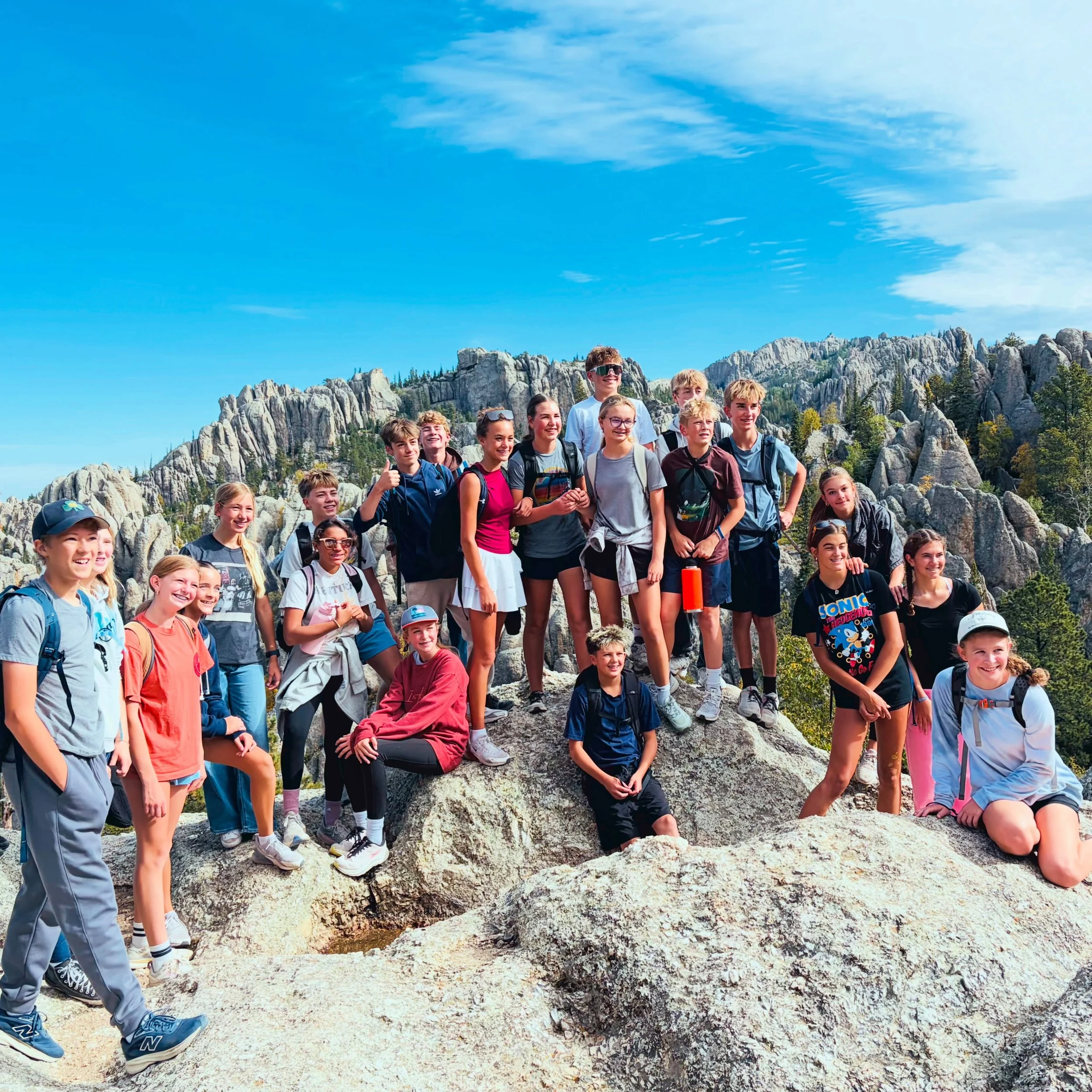 From the summit to the lake! These 8th graders conquered Black Elk Peak and then cooled off in stunning Sylvan Lake. A pretty perfect day in the Black Hills! 🥾⛰️💦