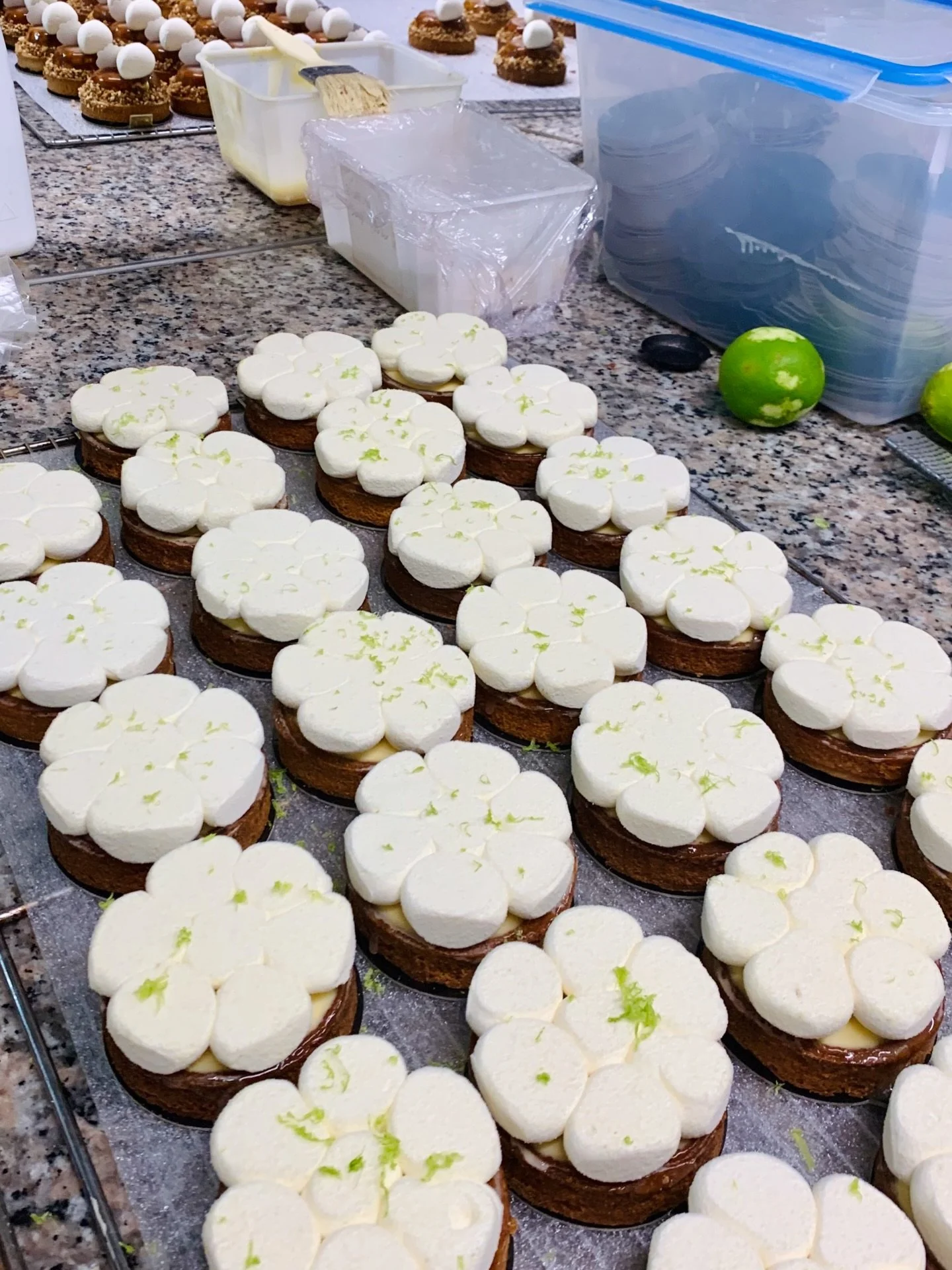 #tbt Making lemon tartes at @stohrer 👩&zwj;🍳 The tarte au citron has a shortcrust pastry base, lemon confit, lemon-lime cr&eacute;meux, and a silky yuzu cream. I LOVE a lemon tarte with something other than meringue. These tartelettes and their fre