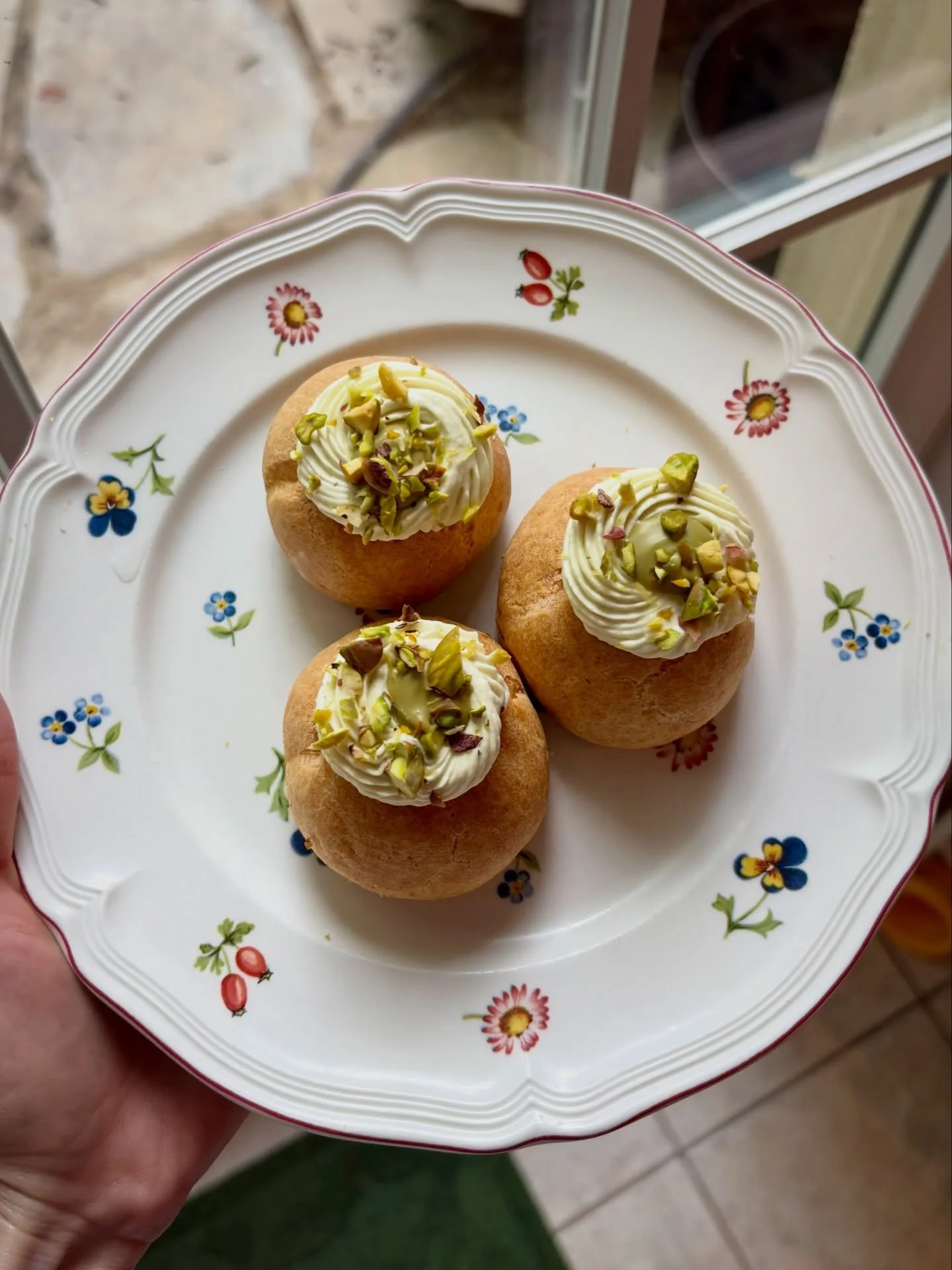Pistachio choux &agrave; la cr&egrave;me (cream puffs). Made them this summer, in just an hour and a half, in two varieties: wheat flour and gluten-free flour for someone with celiac. @dollhouserescuer called them pistachio love bombs. A great name! 