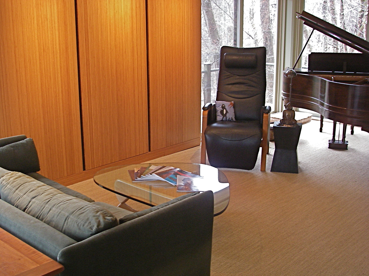 Comfortable seating and good lighting enhance the spacious living room.