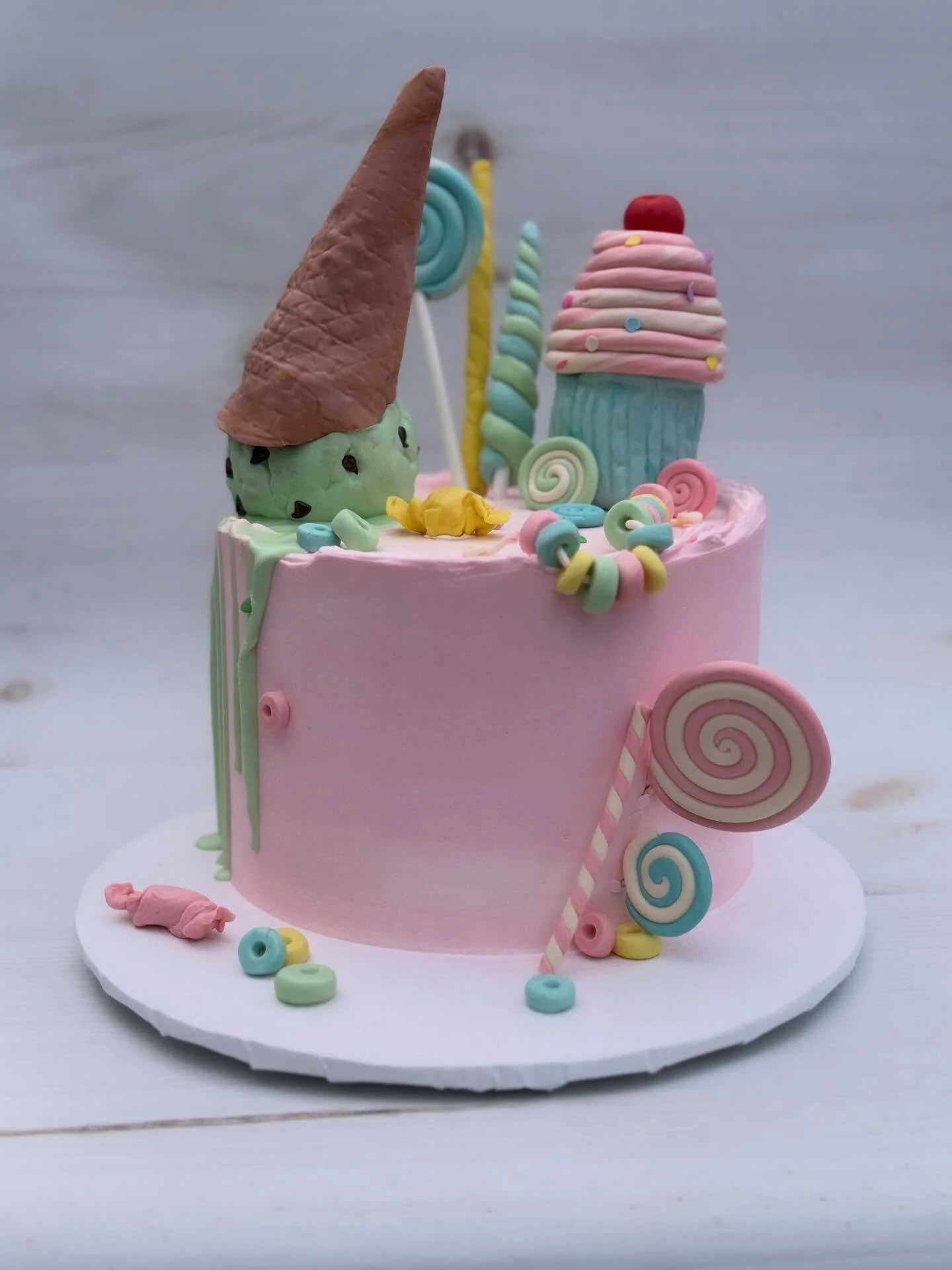 Whimsical and fun!!! She&rsquo;s made from modeling chocolate and Rice Krispies and oh so fun! 
.
.
.
#mamasartisansweets #candycake #pdxcakes #beavertoncakes