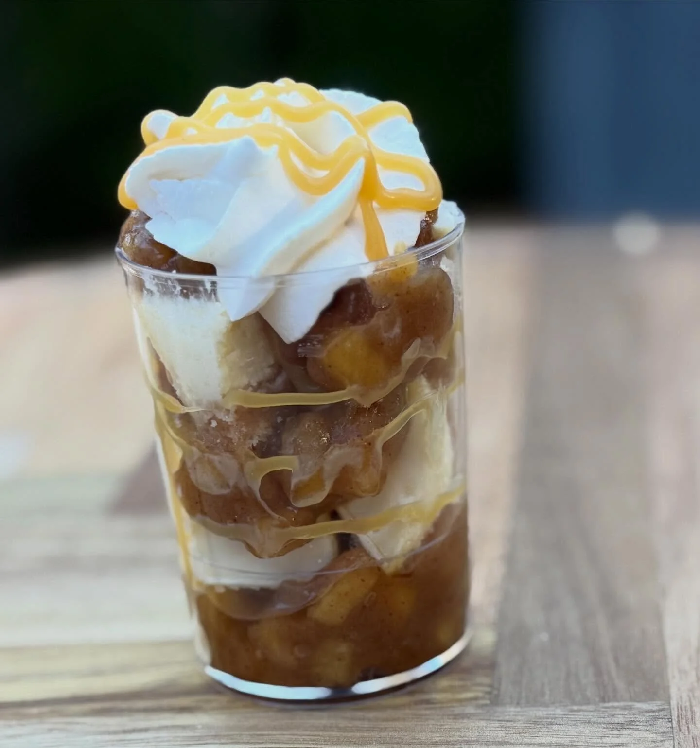 Salted caramel apple pie cheesecake. 
.
.
In English, we have rules for the order of our adjectives.  Determiner, Opinion, Size, Age, Shape, Color, Origin, Material, Purpose, and then the Noun.  As kids, we learn these rules just by building sentence