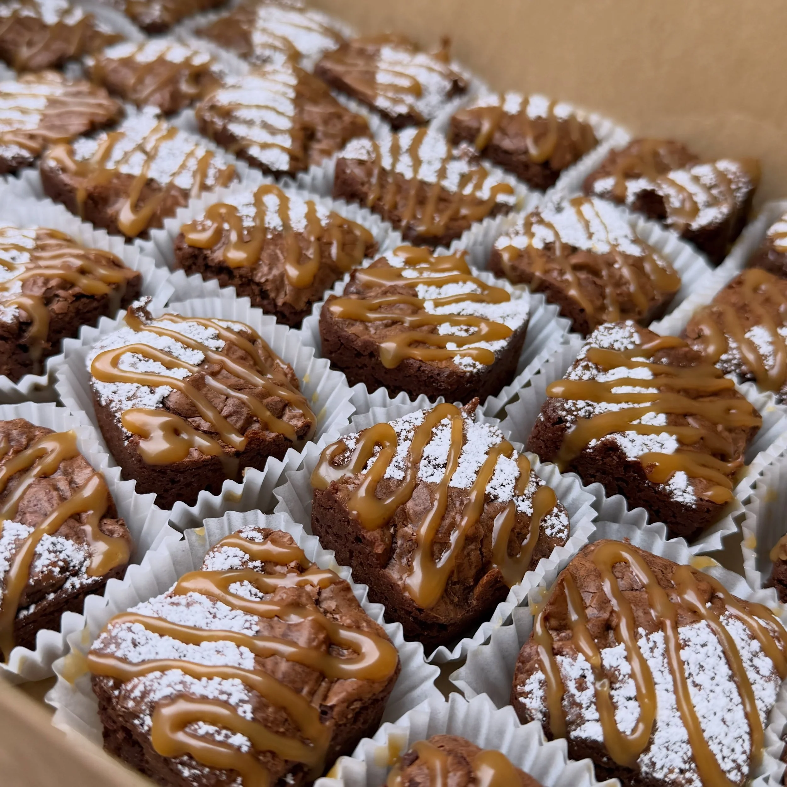 Everything ebbs and flows.  Some weeks I&rsquo;m only making cake&hellip; the last few weeks I&rsquo;m making dessert tables&hellip; and here is a box of brownie bites about to go out the door! 
.
.
I made some salted caramel apple pie cheese cake sh