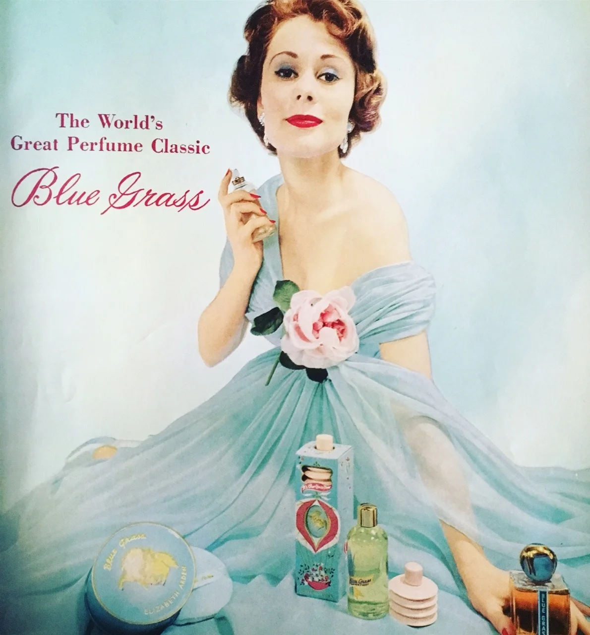 Blue Grass by Elizabeth Arden.
Vogue. June 1957.
The iconic Blue Grass fragrance was introduced in the 1930’s and was inspired by the fields where Arden bred her famous Thoroughbreds. Arden was also famous for her rivalry with fellow self-made cosmetic powerhouse Helena Rubinstein, which has been turned into a new musical on Broadway called “War Paint.”