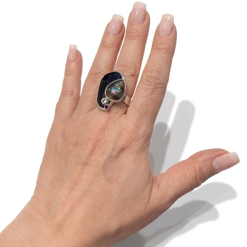 comet-cocktail-ring-rhodolite-topaz-spinel-labradorite-on-hand.jpg