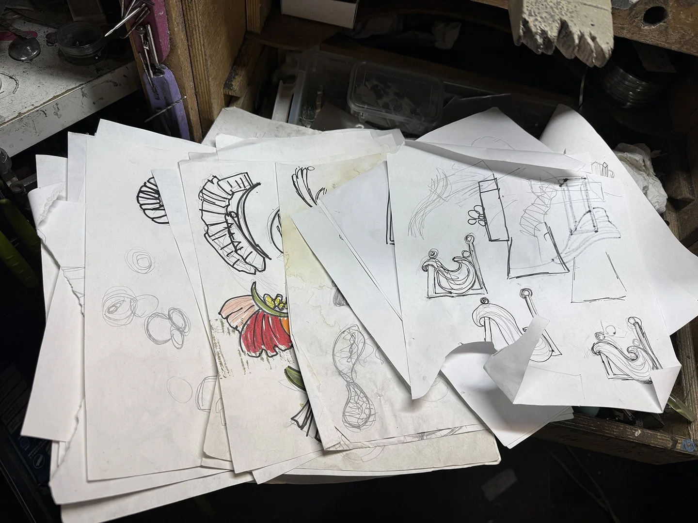 A stack of sketches on Debra Adelson's jewelry bench.
