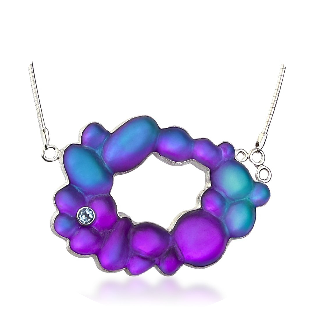 A colorful, statement glass necklace.