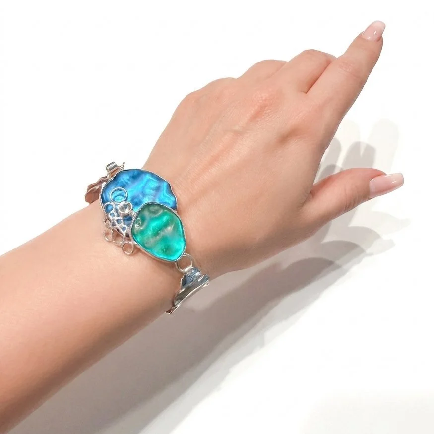 adrift-bracelet-cold-worked-art-glass-and-topaz-on-model-1.jpg