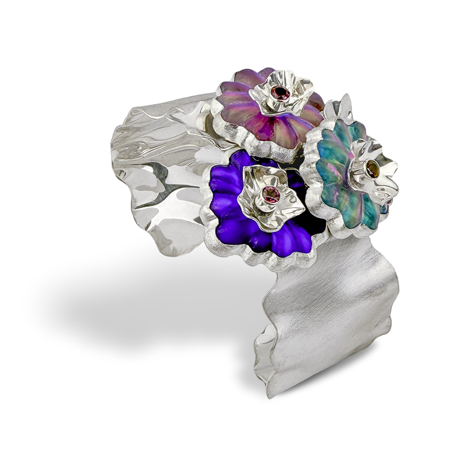 Silver ring with colorful floral carved glass cuff bracelet.