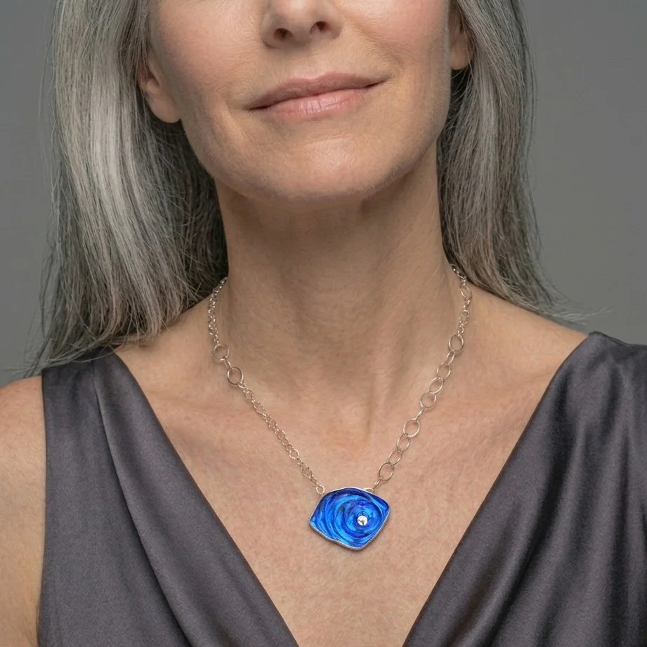blue-orbit-ripple-necklace-on-model.jpg