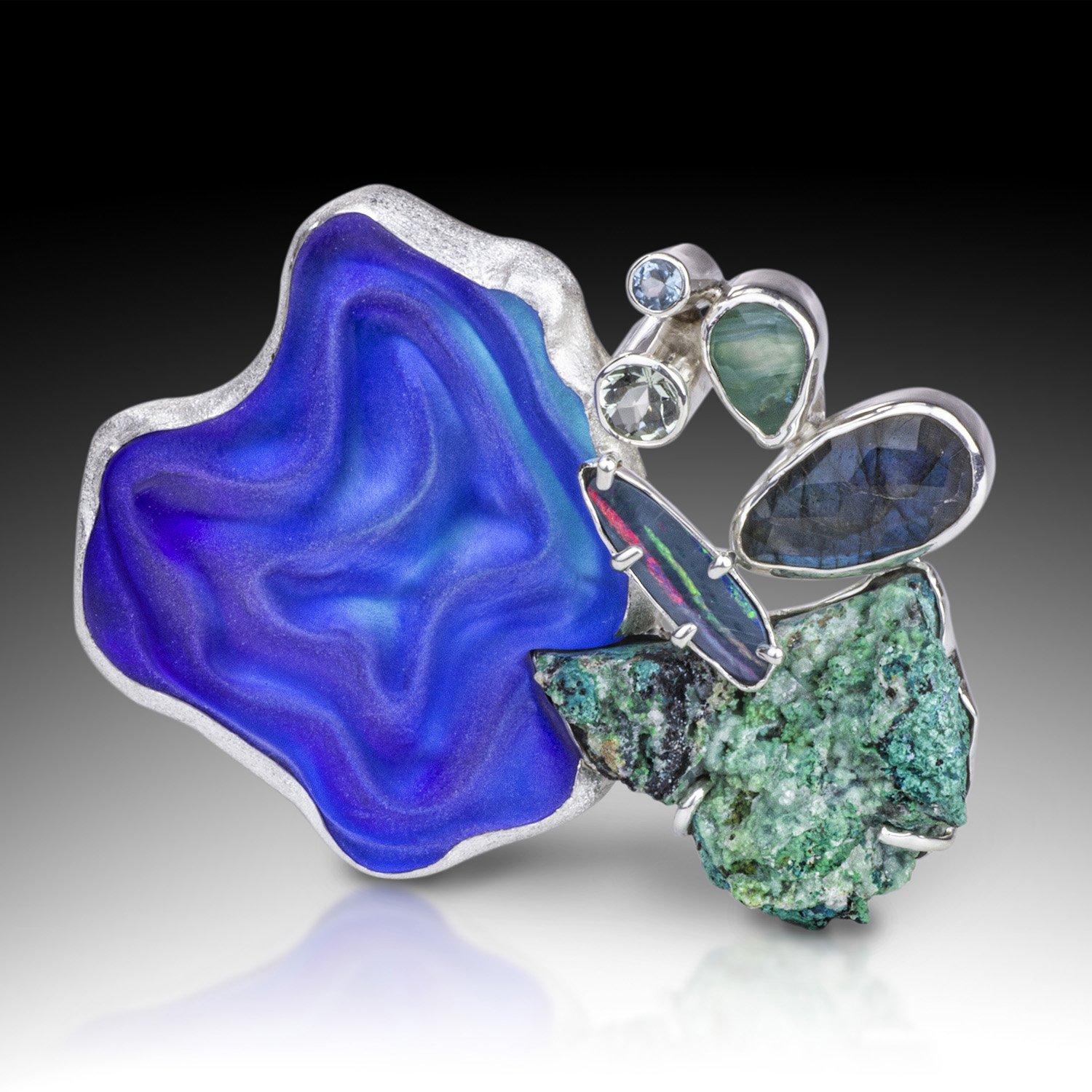 A sterling silver and gemstone convertible art jewelry brooch