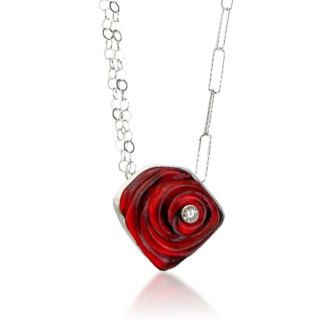 red-orbit-ripple-glass-necklace-with-topaz.jpg