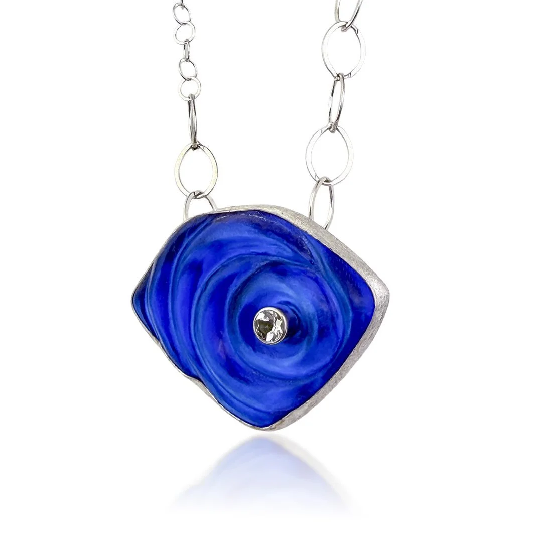blue-orbit-ripple-necklace-glass-necklace-hanging.jpg