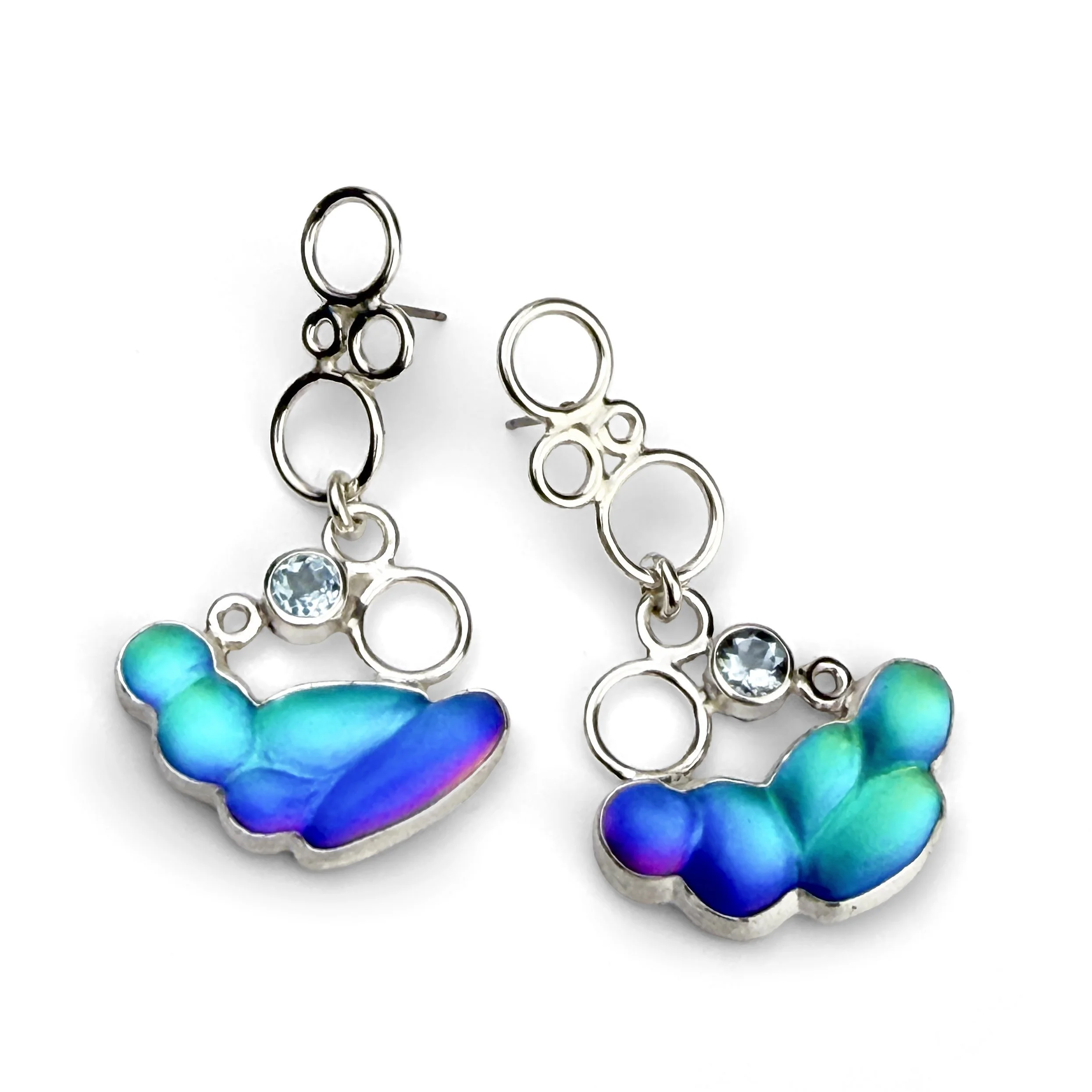A pair of cold-worked glass and sterling silver earrings with genuine topaz.