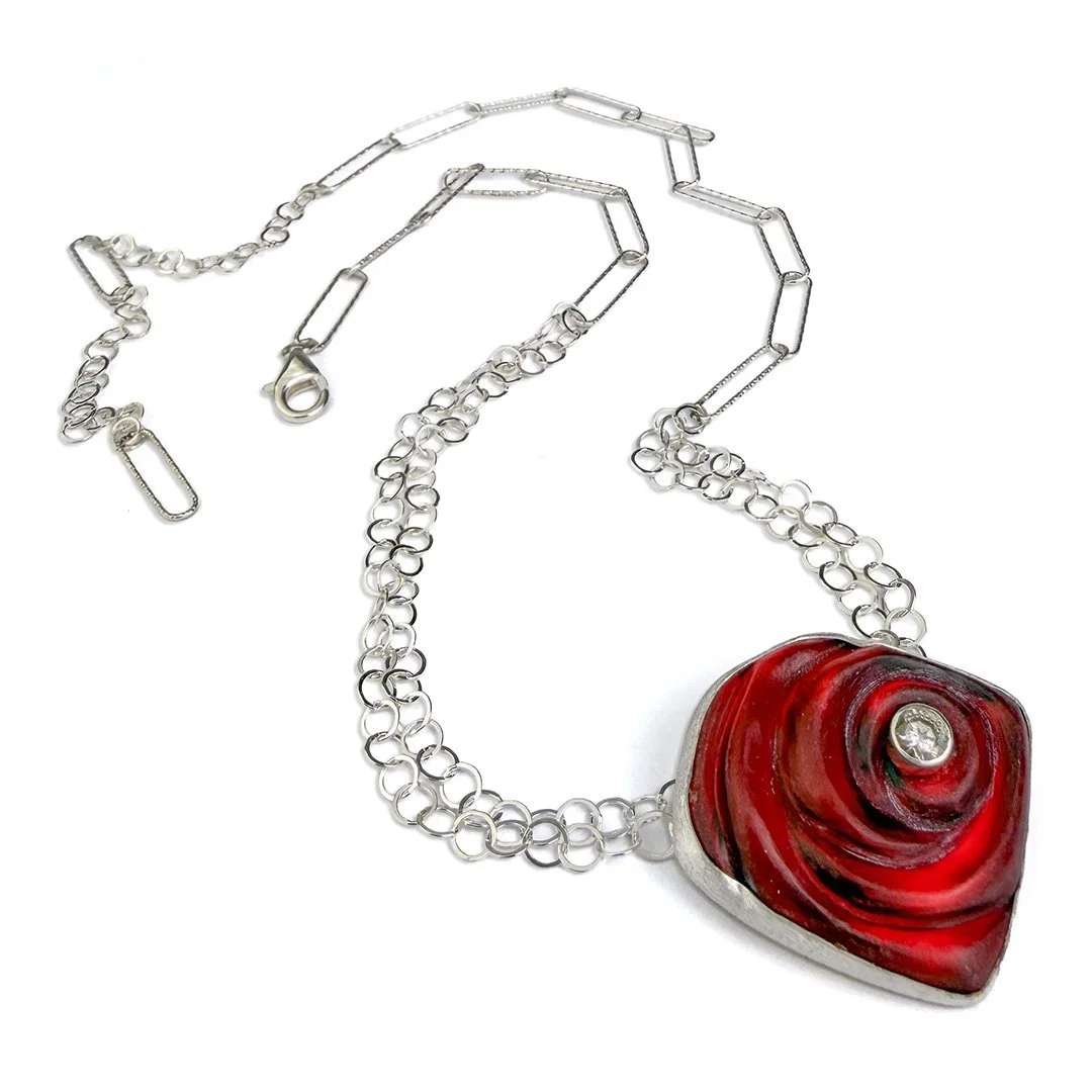 red-orbit-ripple-handmade-glass-necklace-with-topaz.jpg
